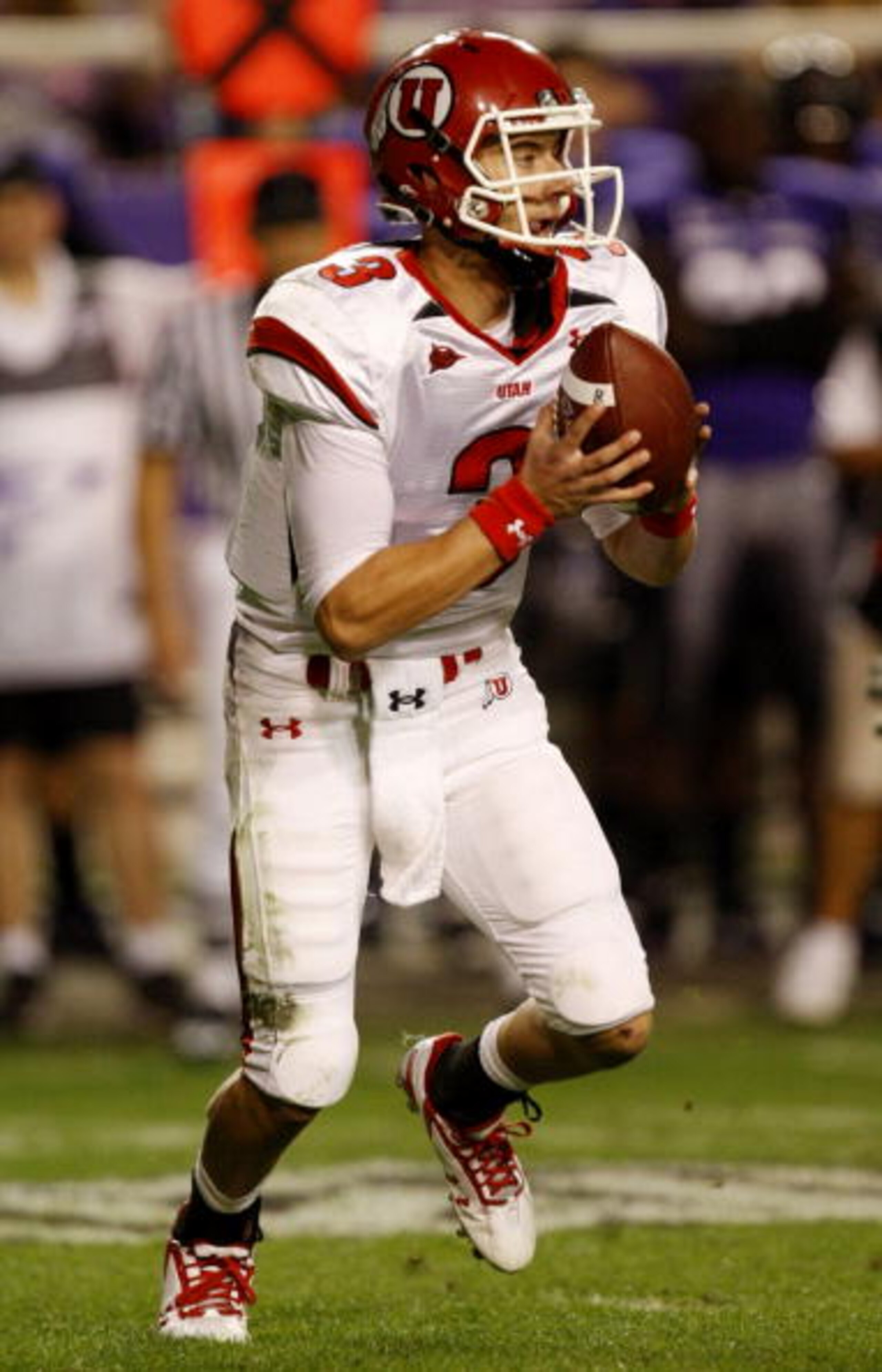 FORT WORTH, TX - NOVEMBER 14:  Quarterback Jordan Wynn #3 of the Utah Utes looks to pass the ball in the second quarter of the game against the TCU Horned Frogs at Amon G. Carter Stadium on November 14, 2009 in Fort Worth, Texas.  (Photo by Ronald Martine