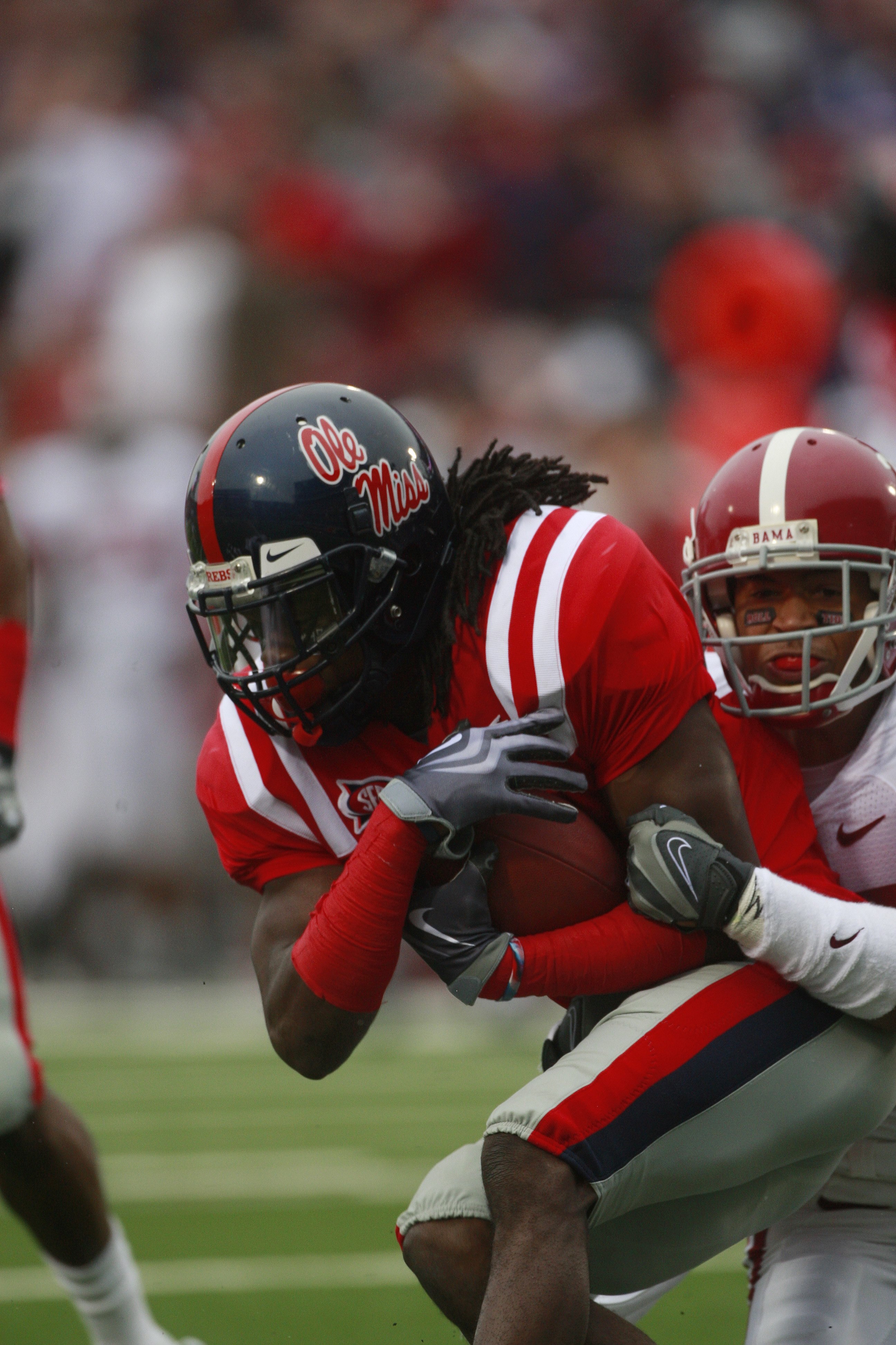 OXFORD, MS - OCTOBER 10:  Wide Receiver Dexter McCluster #22 goes for extra yardage during their game against the Alabama Crimson Tide at Vaught-Hemingway Stadium on October 10, 2009 in Oxford, Mississippi. (Photo by Dave Martin/Getty Images)