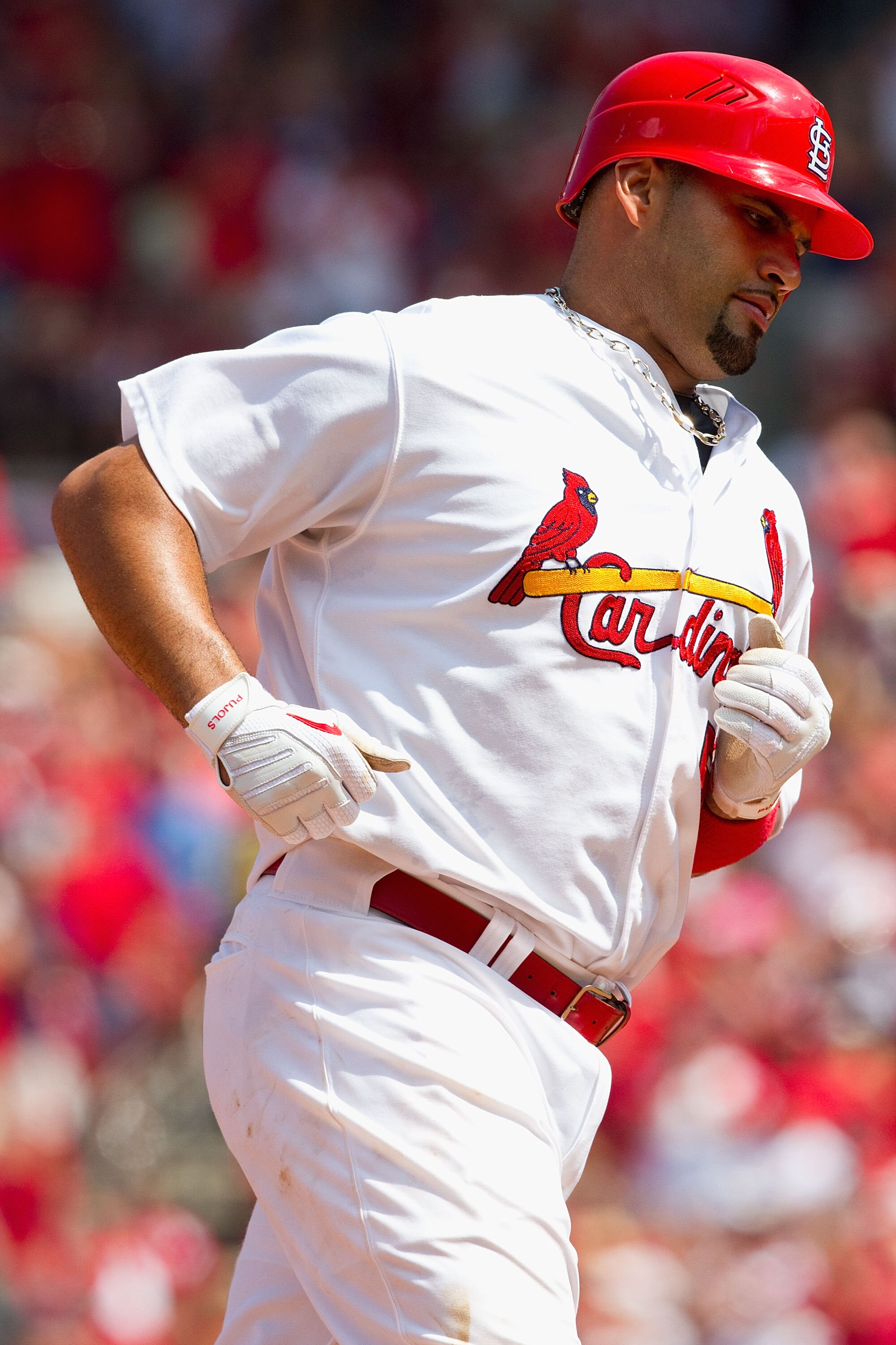 ST. LOUIS - AUGUST 1: Albert Pujols #5 of the St. Louis Cardinals rounds the bases after hitting a two-run home run against the Pittsburgh Pirates at Busch Stadium on August 1, 2010 in St. Louis, Missouri.  The Cardinals beat the Pirates 9-1.  (Photo by D