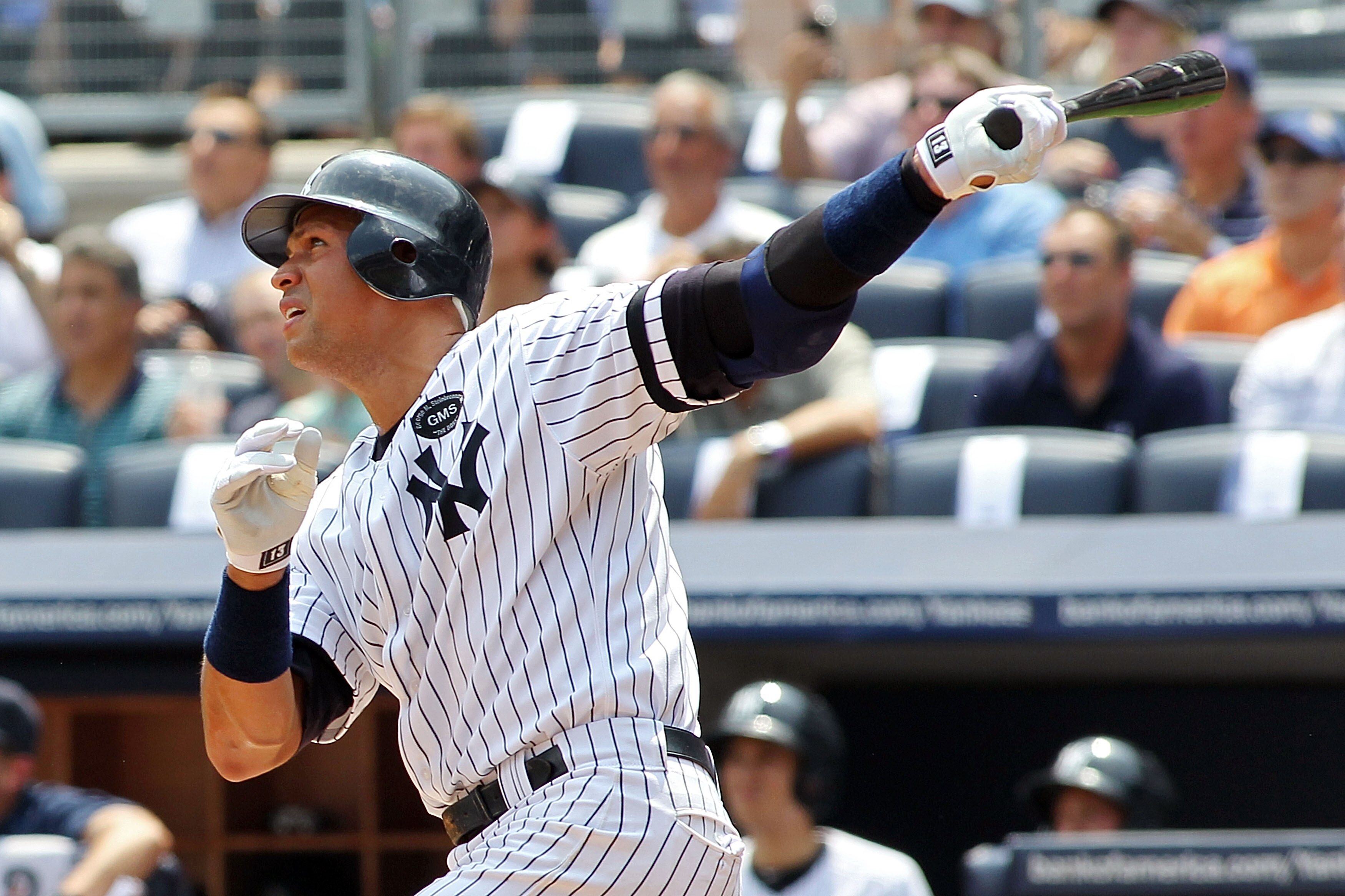 NEW YORK - AUGUST 04:  Alex Rodriguez #13 of the New York Yankees hits the 600th home run of his career in the first inning against the Toronto Blue Jays on August 4, 2010 at Yankee Stadium in the Bronx borough of New York City.  (Photo by Michael Heiman/