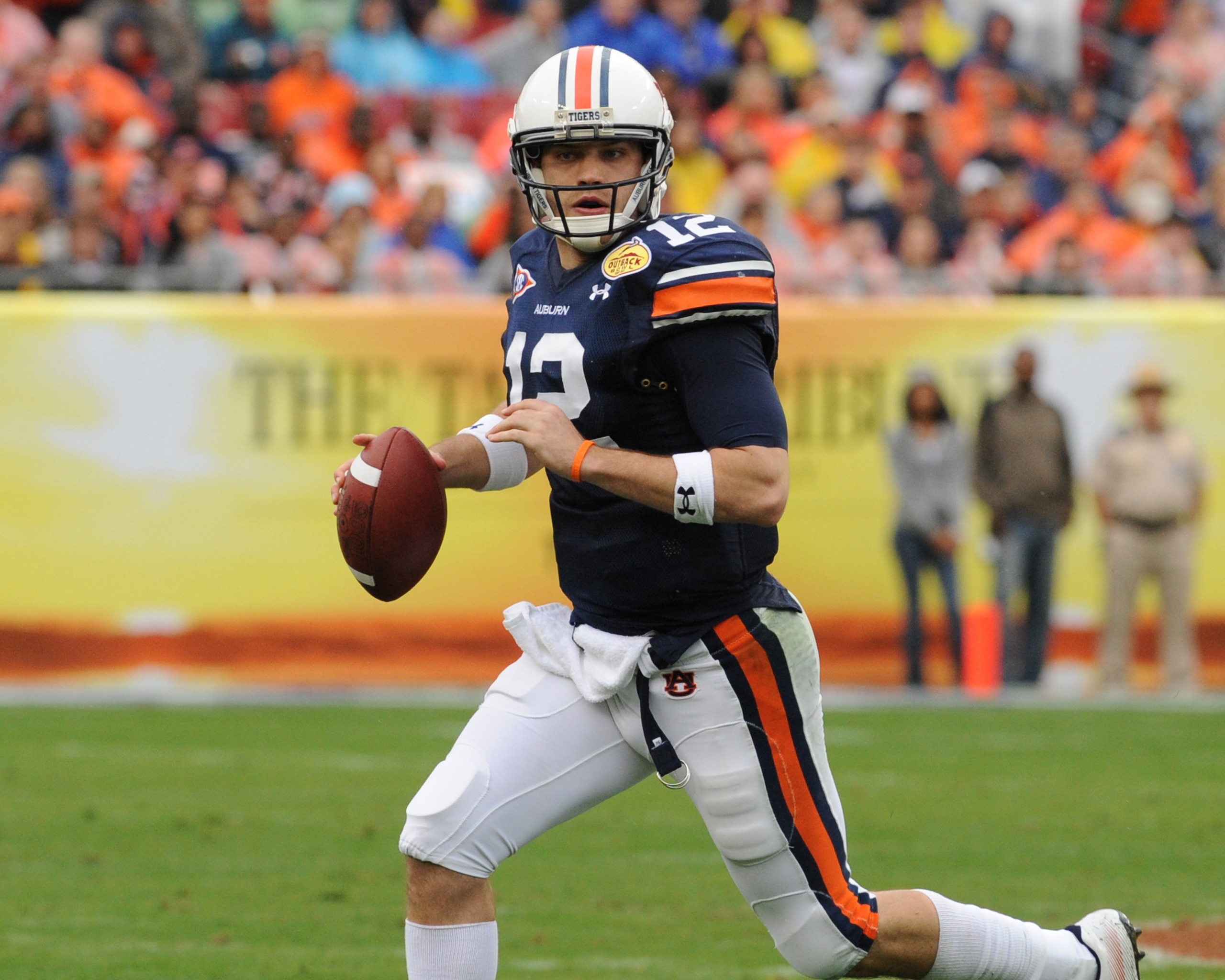 TAMPA, FL - JANUARY 1: Quarterback Chris Todd #12 of the Auburn Tigers sets to pass against the Northwestern Wildcats in the Outback Bowl January 1, 2010 at Raymond James Stadium in Tampa, Florida.  (Photo by Al Messerschmidt/Getty Images)