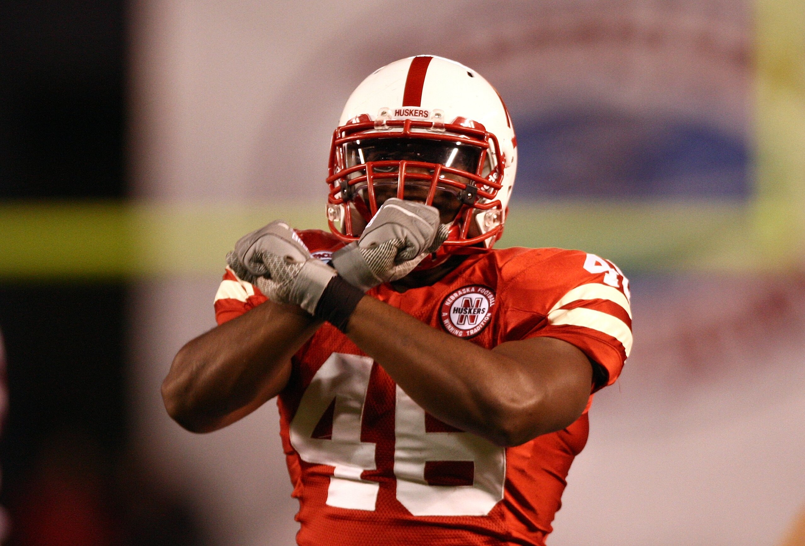 SAN DIEGO - DECEMBER 30:  Eric Martin #46 of the University of Nebraska Cornhuskers celebrates after a defensive play during the Pacific Life Holiday Bowl against University of Arizona Wildcats on December 30, 2009 at Qualcomm Stadium in San Diego, Califo