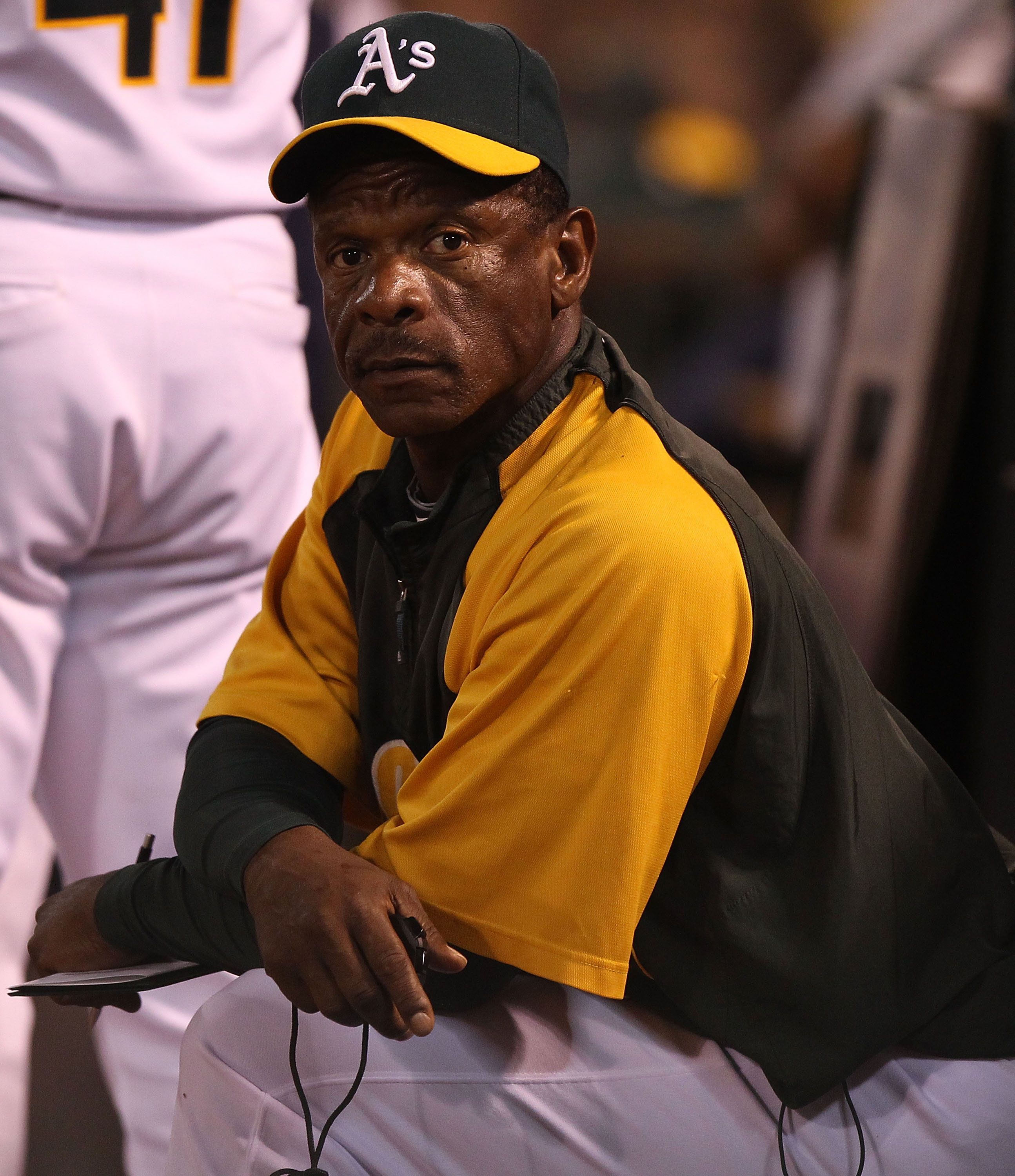 OAKLAND, CA - SEPTEMBER 24:  Former member of the Oakland Athletics Rickey Henderson looks on against the Texas Rangers during a Major League Baseball game at the Oakland-Alameda County Coliseum on September 24, 2010 in Oakland, California. (Photo by Jed