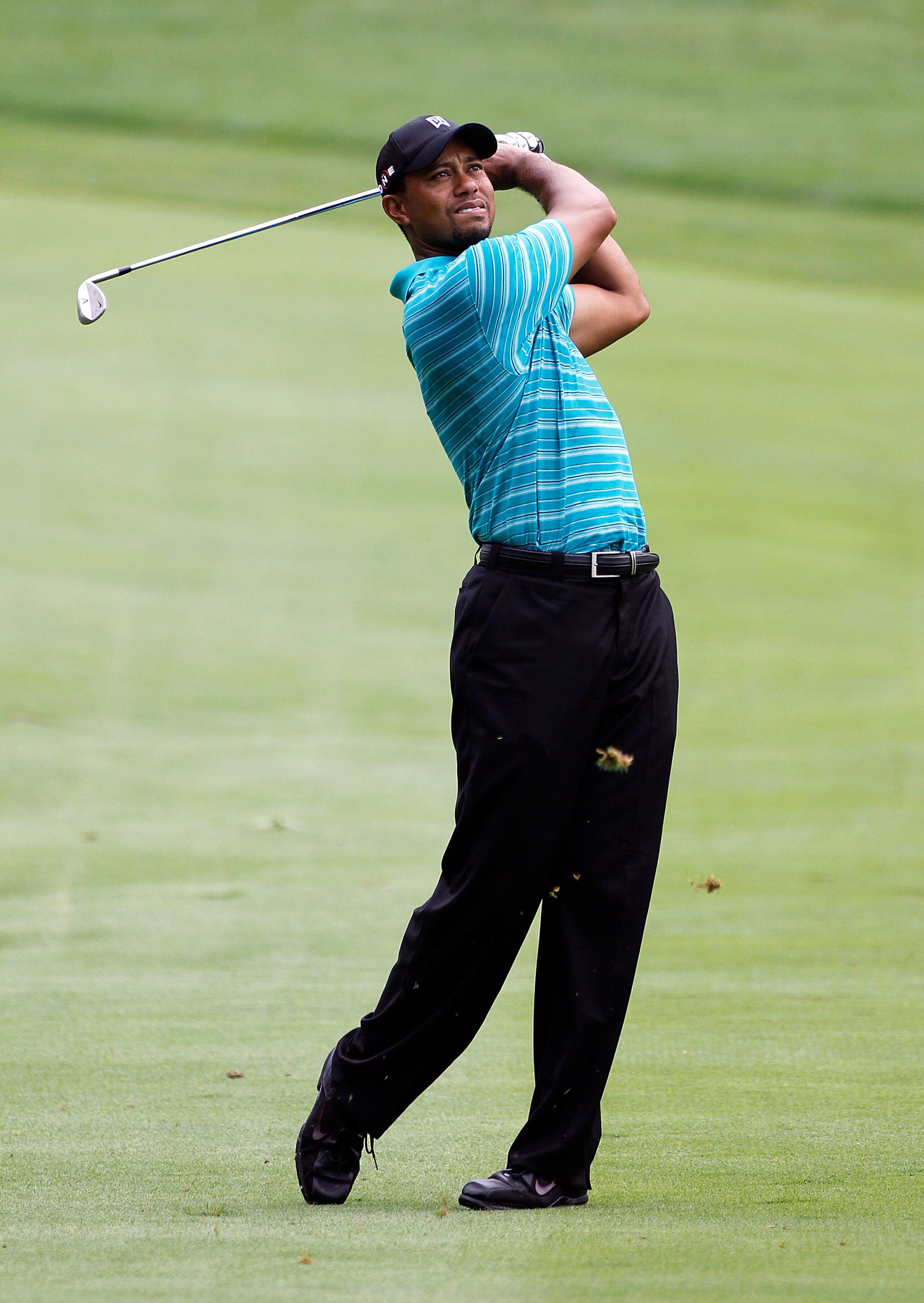 AKRON, OH - AUGUST 04: Tiger Woods plays a shot during a practice round prior to the WGC- Bridgestone Invitational on the South Course at Firestone Country Club on August 4, 2010 in Akron, Ohio. (Photo by Sam Greenwood/Getty Images) AKRON, OH - AUGUST 04: Tiger Woods plays a shot during a practice round prior to the WGC- Bridgestone Invitational on the South Course at Firestone Country Club on August 4, 2010 in Akron, Ohio. (Photo by Sam Greenwood/Getty Images)