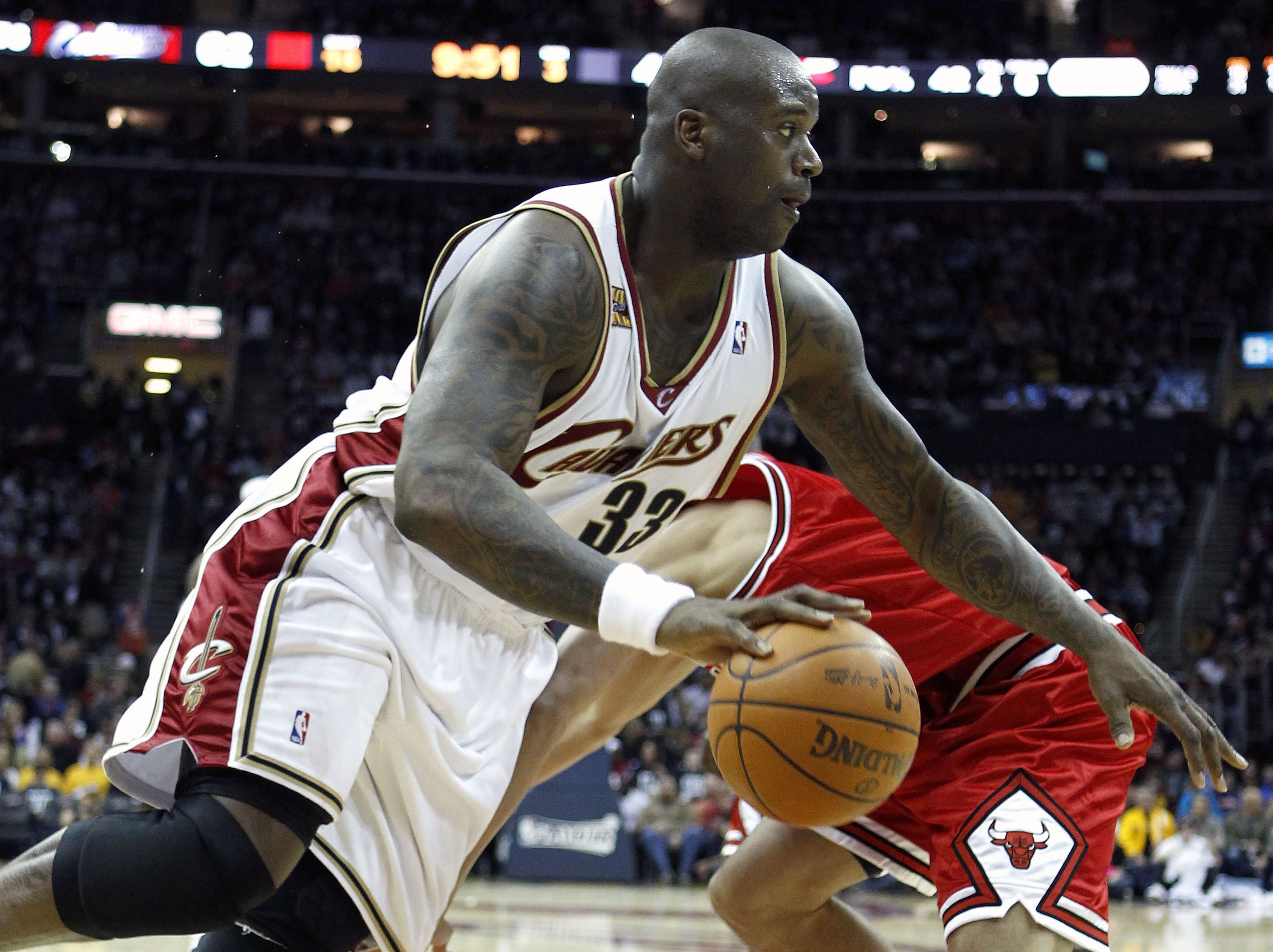 CLEVELAND - APRIL 17:  Shaquille O'Neal #18 of the Cleveland Cavaliers makes a move around Joakim Noah #13 of the Chicago Bulls in Game One of the Eastern Conference Quarterfinals during the 2010 NBA Playoffs at Quicken Loans Arena on April 17, 2010 in Cl