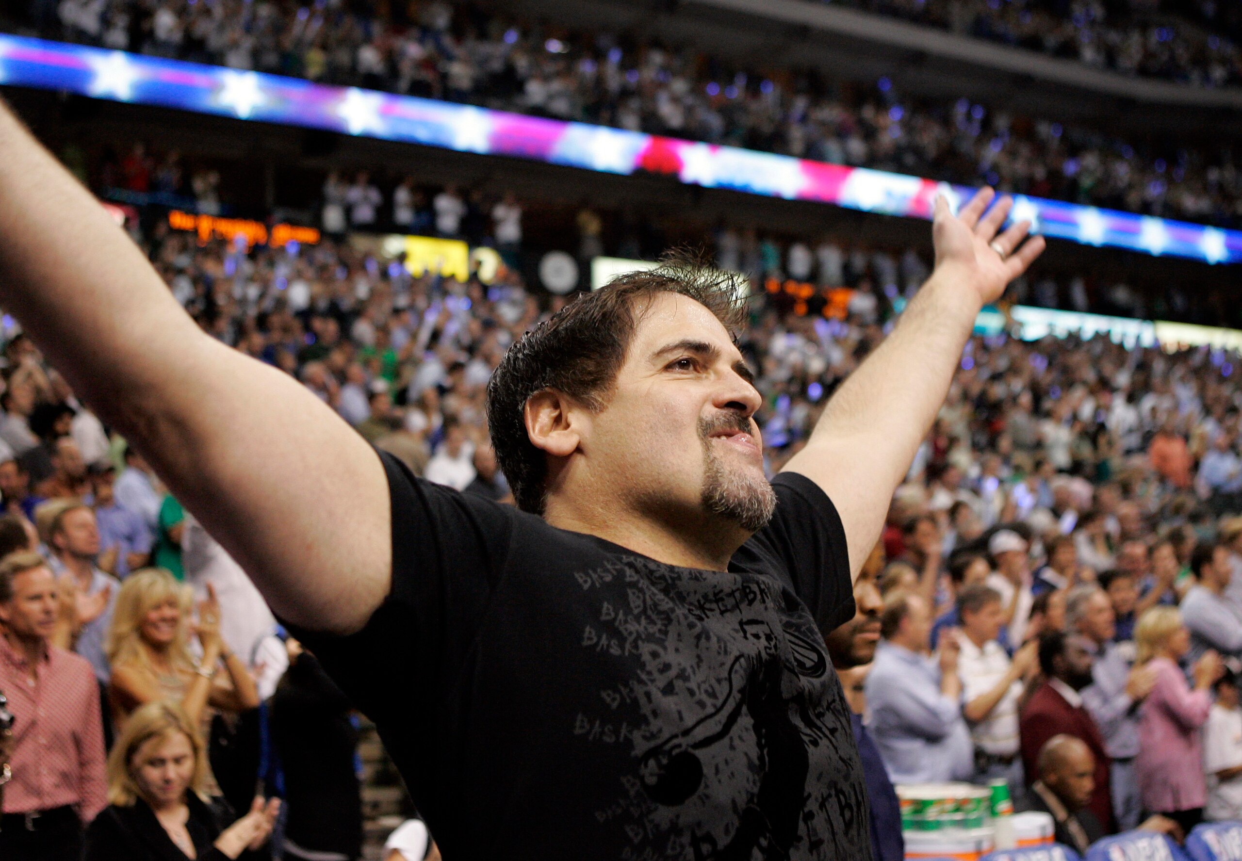 DALLAS - MAY 1: Owner of the Dallas Mavericks Mark Cuban cheers on his team before the start of the game against the Golden State Warriors in Game Five of the Western Conference Quarterfinals during the 2007 NBA Playoffs on May 1, 2007 at American Airlin DALLAS - MAY 1: Owner of the Dallas Mavericks Mark Cuban cheers on his team before the start of the game against the Golden State Warriors in Game Five of the Western Conference Quarterfinals during the 2007 NBA Playoffs on May 1, 2007 at American Airlin