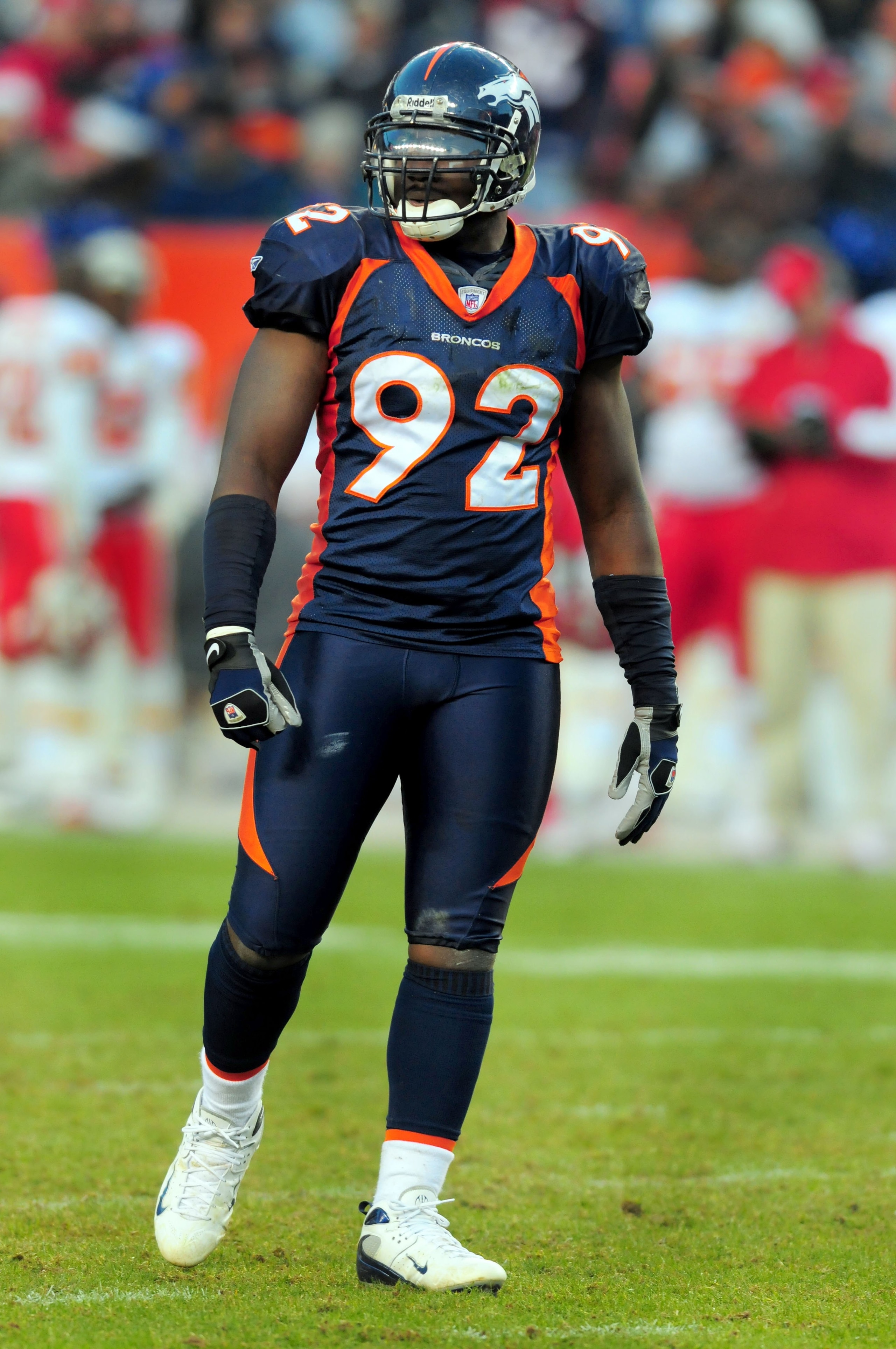 DENVER - DECEMBER 9:  Elvis Dumervil #92 of the Denver Broncos looks over to the sidelines in the third quarter of the football game against the Kansas City Chiefs at Invesco Field at Mile High on December 9, 2007 in Denver, Colorado.  (Photo by Steve Dyk