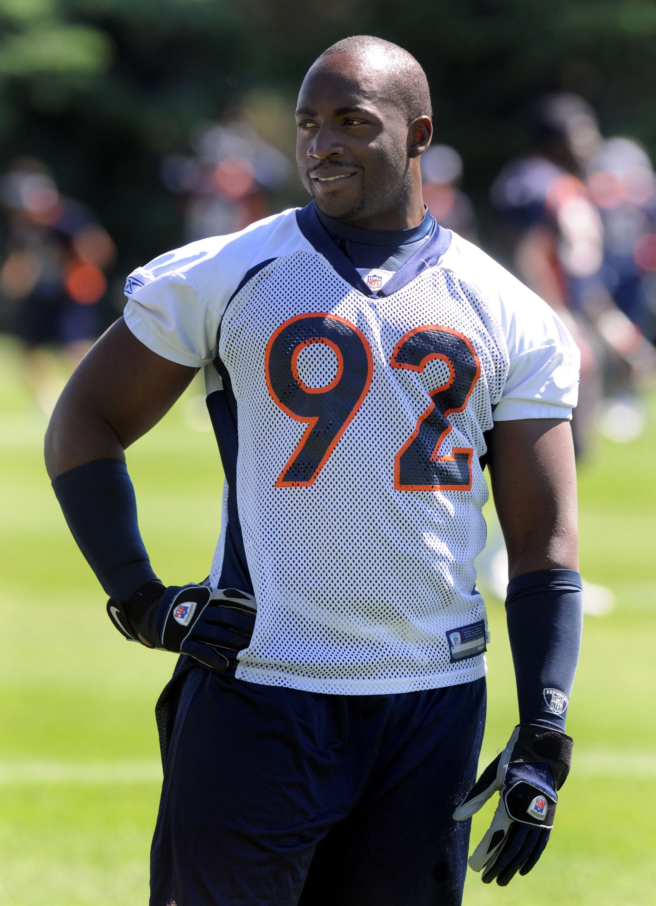 ENGLEWOOD, CO - JUNE 12: Defensive end Elvis Dumervil #92 of the Denver Broncos looks on from the sidelines during mini camp on June 12, 2008 at the Bronco training facility in Englewood, Colorado.  (Photo by Steve Dykes/Getty Images)