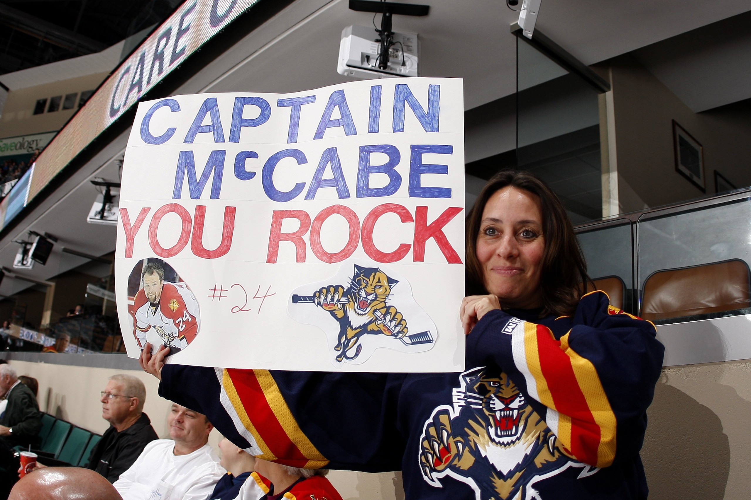 SUNRISE, FL - JANUARY 23: Florida Panthers fan Laura Stenicky holds up a sign supporting Bryan McCabe (not pictured) prior to the game against the Toronto Maple Leafs on January 23, 2010 at the BankAtlantic Center in Sunrise, Florida. The Panthers defeate
