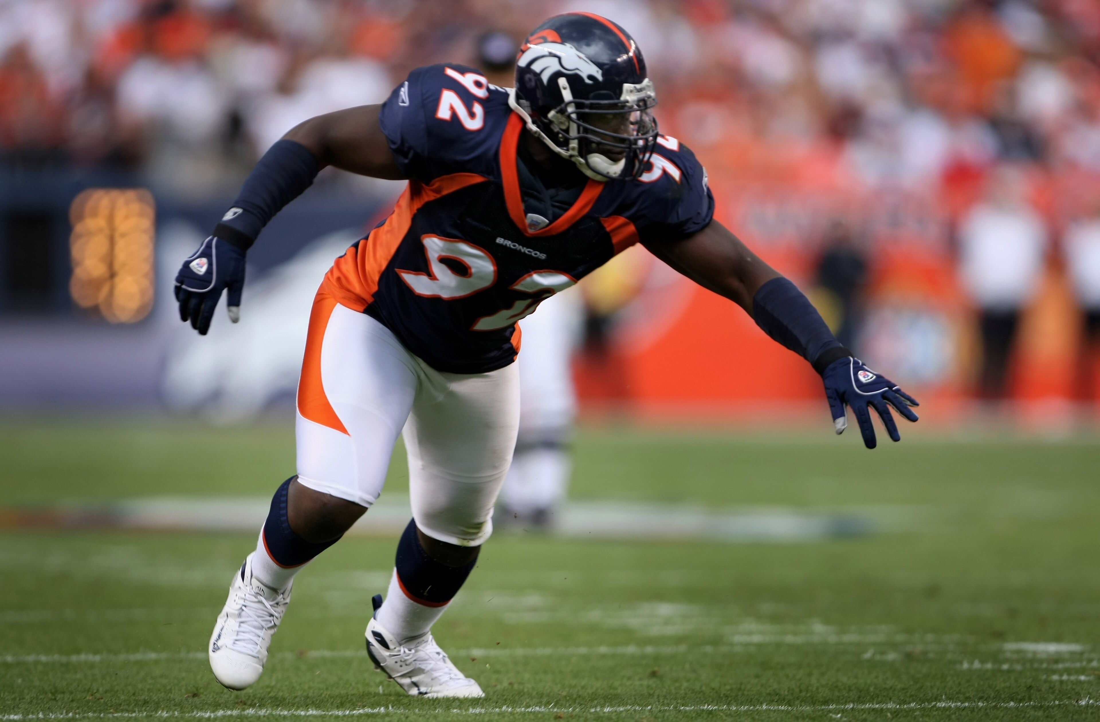 DENVER - SEPTEMBER 16:  Defensive end Elvis Dumervil #92 of the Denver Broncos leaves the line of scrimmage as the Denver Broncos defeated the Oakland Raiders 23-20 in overtime during week two NFL action at Invesco Field at Mile High on September 16, 2007