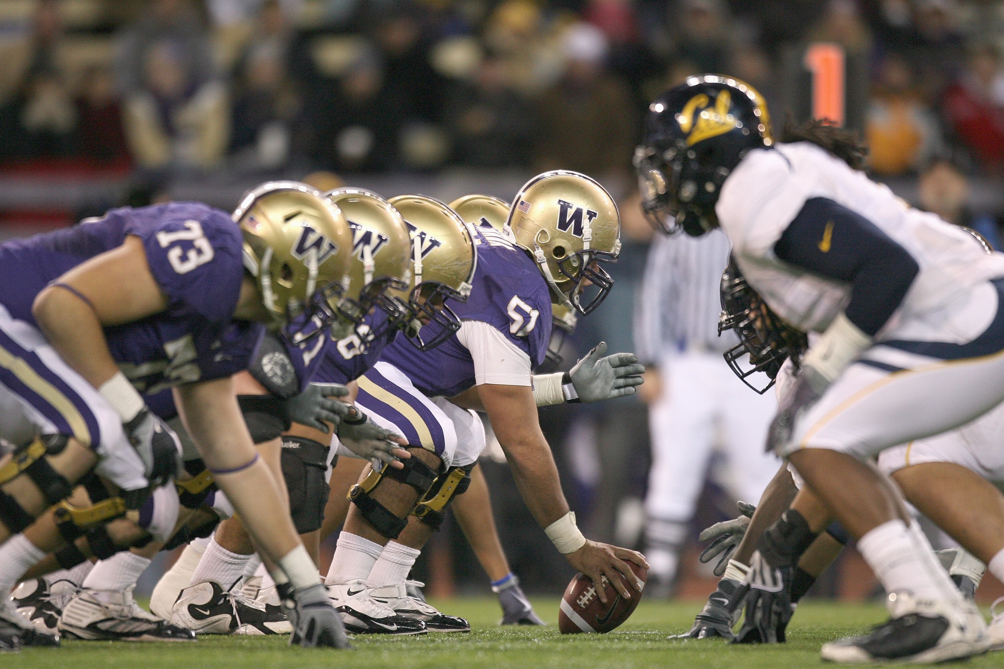 SEATTLE - DECEMBER 05:  Center Mykenna Ikehara #51 of the Washington Huskies gets ready to hike the ball during game against the California Bears on December 5, 2009 at Husky Stadium in Seattle, Washington. The Huskies defeated the Bears 42-10. (Photo by 
