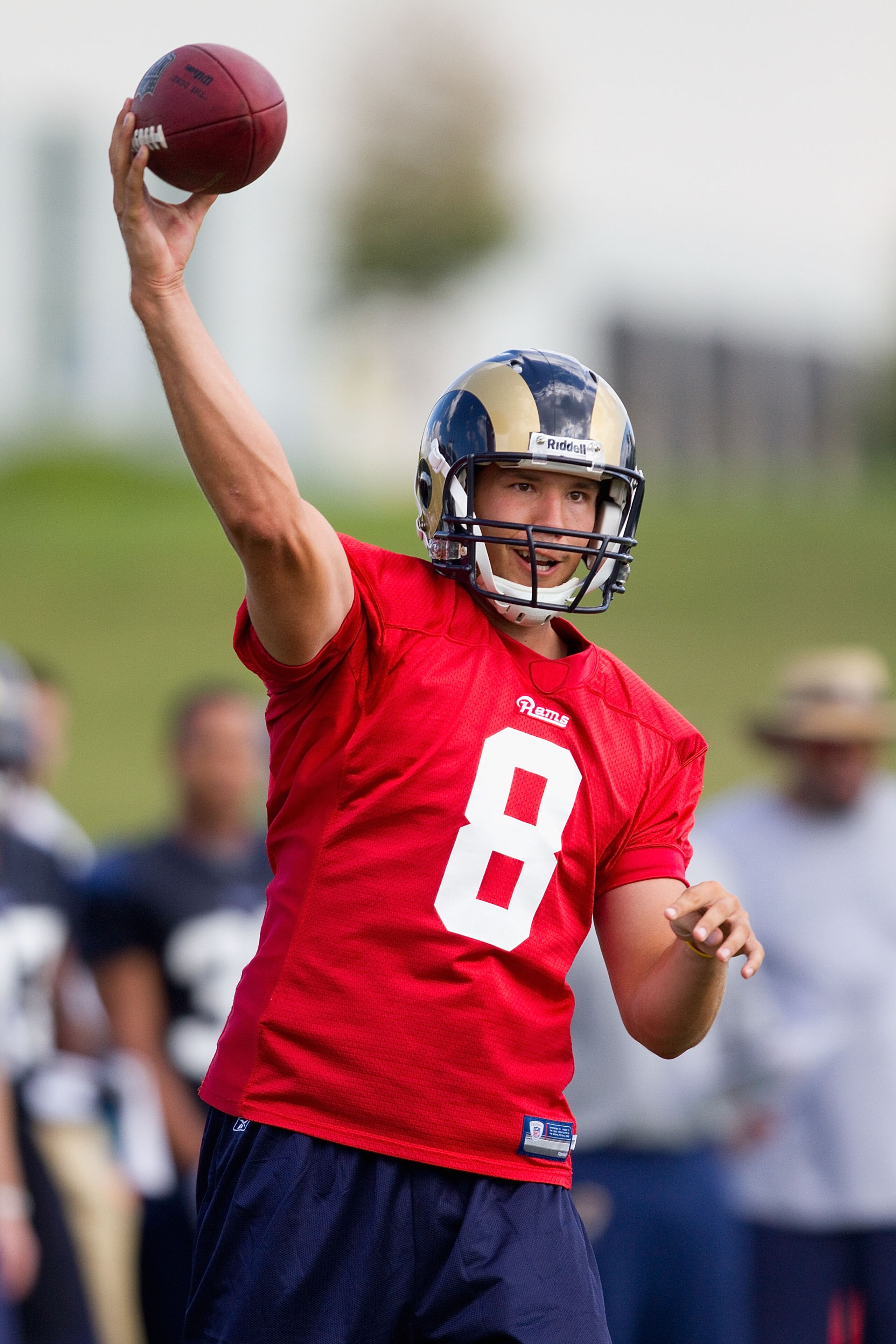 EARTH CITY, MO - JULY 31: Sam Bradford #8 of the St. Louis Rams passes during training camp at the Russell Athletic Training Facility on July 31, 2010 in Earth City, Missouri.  (Photo by Dilip Vishwanat/Getty Images)