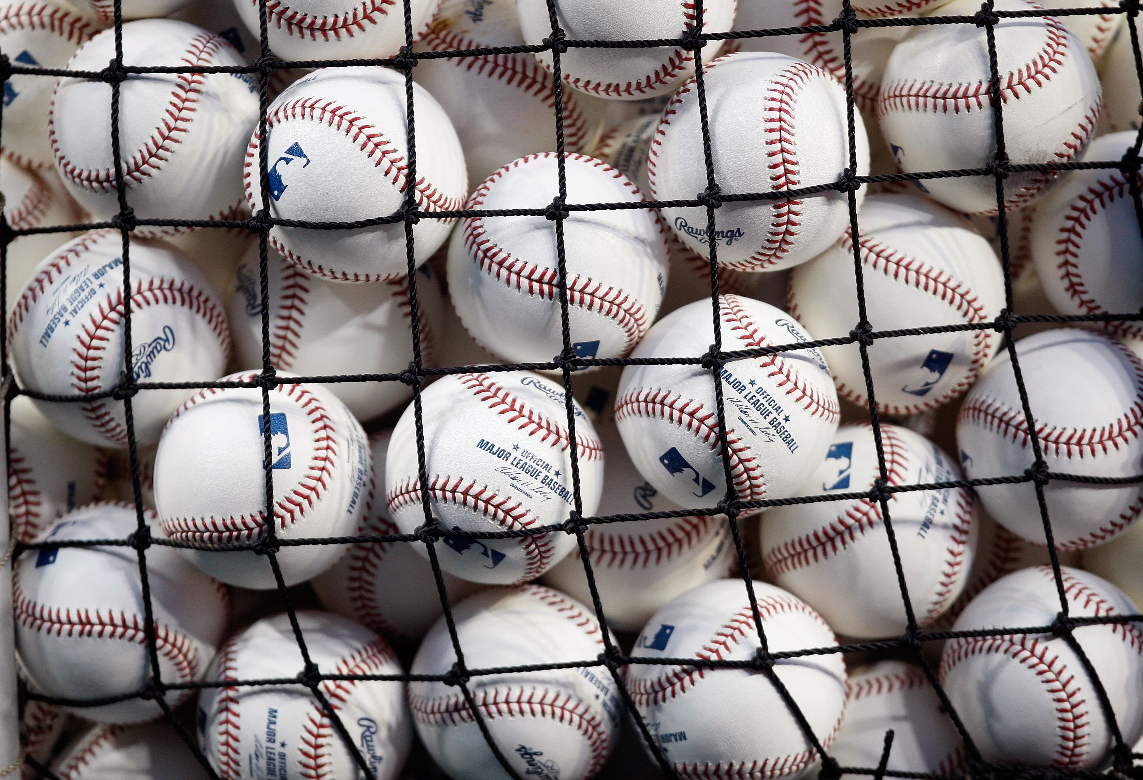 NEW YORK - OCTOBER 28:  A detail of baseballs is seen through netting of a basket during Game One of the 2009 MLB World Series between the New York Yankees and the Philadelphia Phillies at Yankee Stadium on October 28, 2009 in the Bronx borough of New Yor