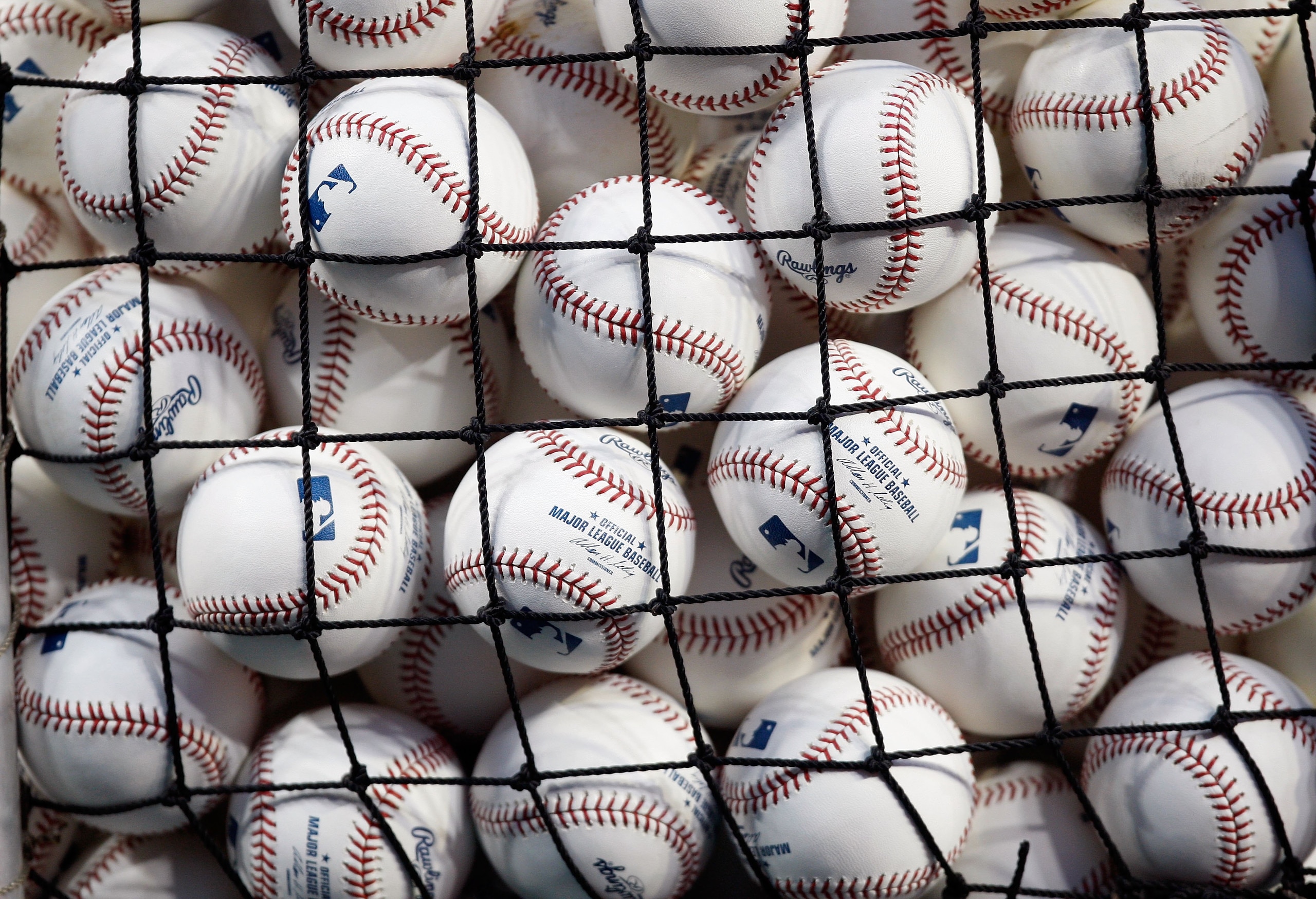NEW YORK - OCTOBER 28:  A detail of baseballs is seen through netting of a basket during Game One of the 2009 MLB World Series between the New York Yankees and the Philadelphia Phillies at Yankee Stadium on October 28, 2009 in the Bronx borough of New Yor