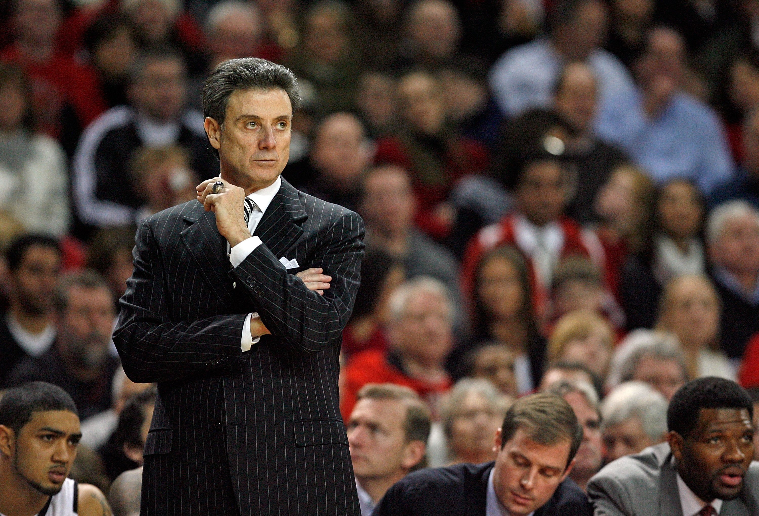 LOUISVILLE, KY - DECEMBER 30:  Rick Pitino the Head coach of the Louisville Cardinals gives instructions to his team during the Big East Conference game against the South Florida Bulls  on December 30, 2009 in Louisville, Kentucky.  (Photo by Andy Lyons/G
