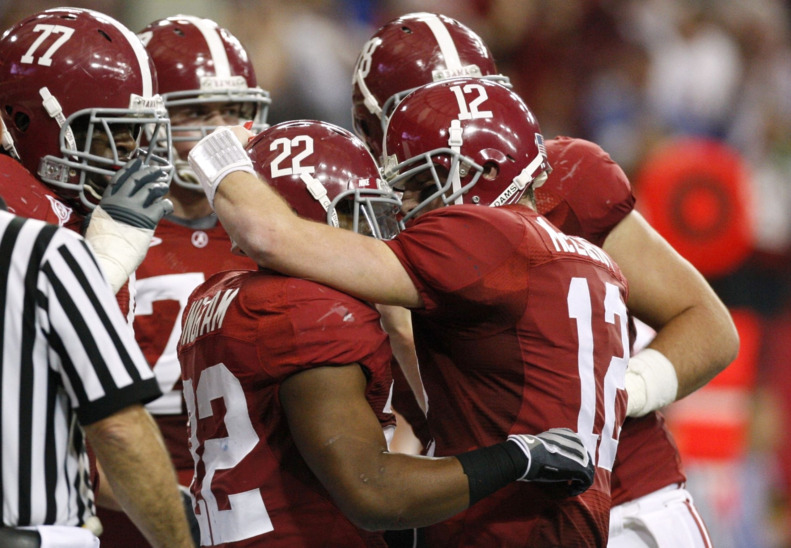 ATLANTA - DECEMBER 5: Mark Ingram #22 and quarterback Greg McElroy #12 of the Alabama Crimson Tidecelebrate after Ingram scored a 7-yard rushing touchdown in the first quarter against the Florida Gators during the SEC Championship game at Georgia Dome on ATLANTA - DECEMBER 5: Mark Ingram #22 and quarterback Greg McElroy #12 of the Alabama Crimson Tidecelebrate after Ingram scored a 7-yard rushing touchdown in the first quarter against the Florida Gators during the SEC Championship game at Georgia Dome on