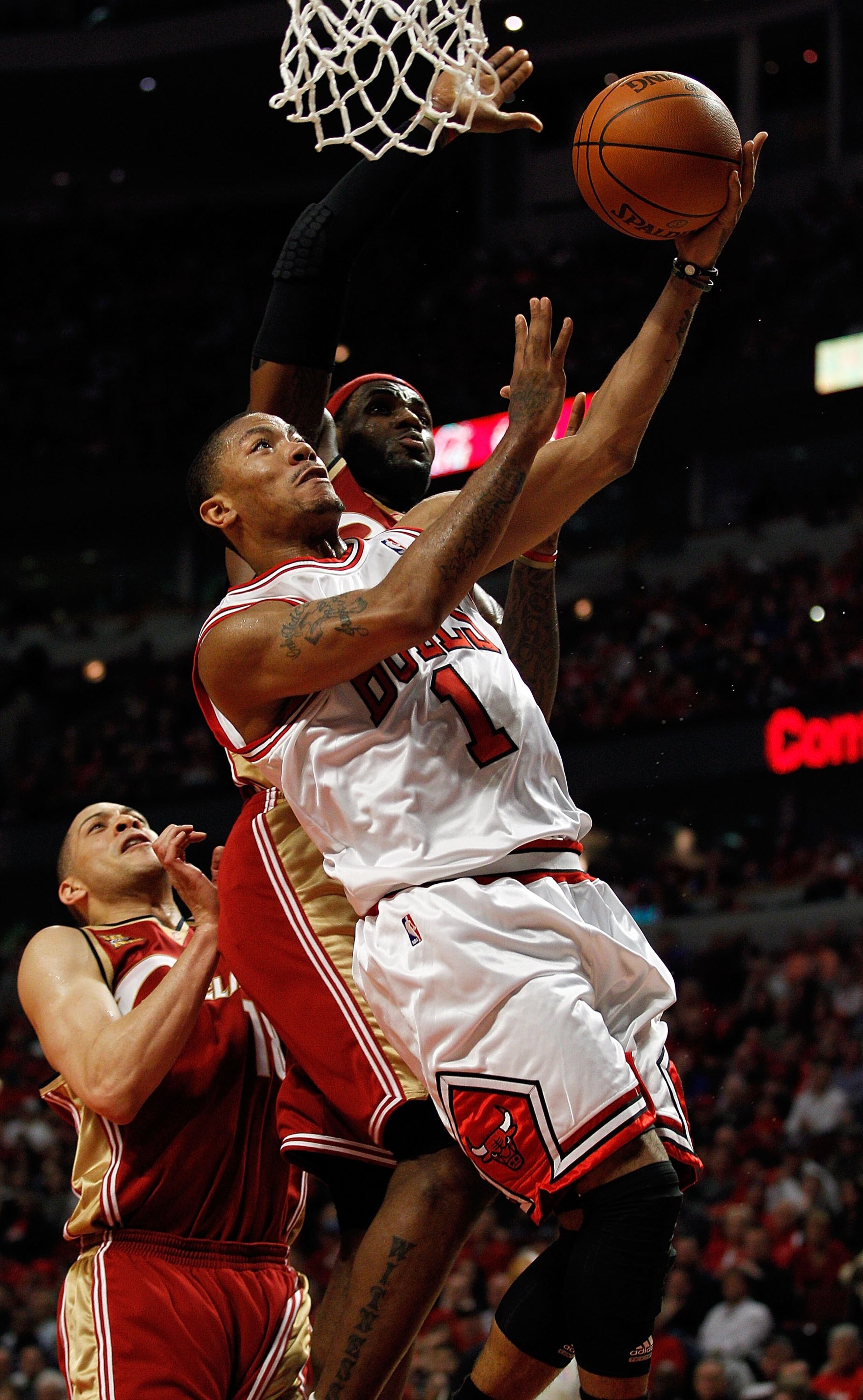 CHICAGO - APRIL 25: Derrick Rose #1 of the Chicago Bulls drives to the basket past LeBron James #23 of the Cleveland Cavaliers in Game Four of the Eastern Conference Quarterfinals during the 2010 NBA Playoffs at the United Center on April 25, 2010 in Chic CHICAGO - APRIL 25: Derrick Rose #1 of the Chicago Bulls drives to the basket past LeBron James #23 of the Cleveland Cavaliers in Game Four of the Eastern Conference Quarterfinals during the 2010 NBA Playoffs at the United Center on April 25, 2010 in Chic