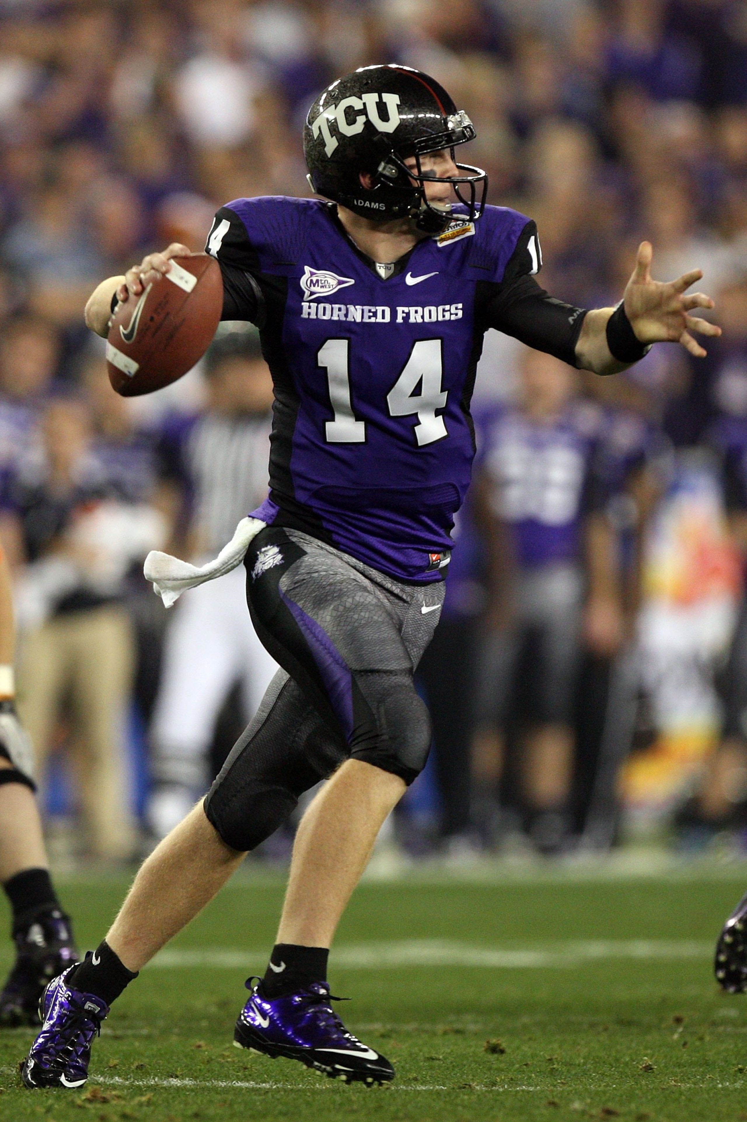 GLENDALE, AZ - JANUARY 04: Quarterback Andy Dalton #14 of the TCU Horned Frogs passes the ball against the Boise State Broncos during the Tostitos Fiesta Bowl at the Universtity of Phoenix Stadium on January 4, 2010 in Glendale, Arizona. (Photo by Jed J GLENDALE, AZ - JANUARY 04: Quarterback Andy Dalton #14 of the TCU Horned Frogs passes the ball against the Boise State Broncos during the Tostitos Fiesta Bowl at the Universtity of Phoenix Stadium on January 4, 2010 in Glendale, Arizona. (Photo by Jed J
