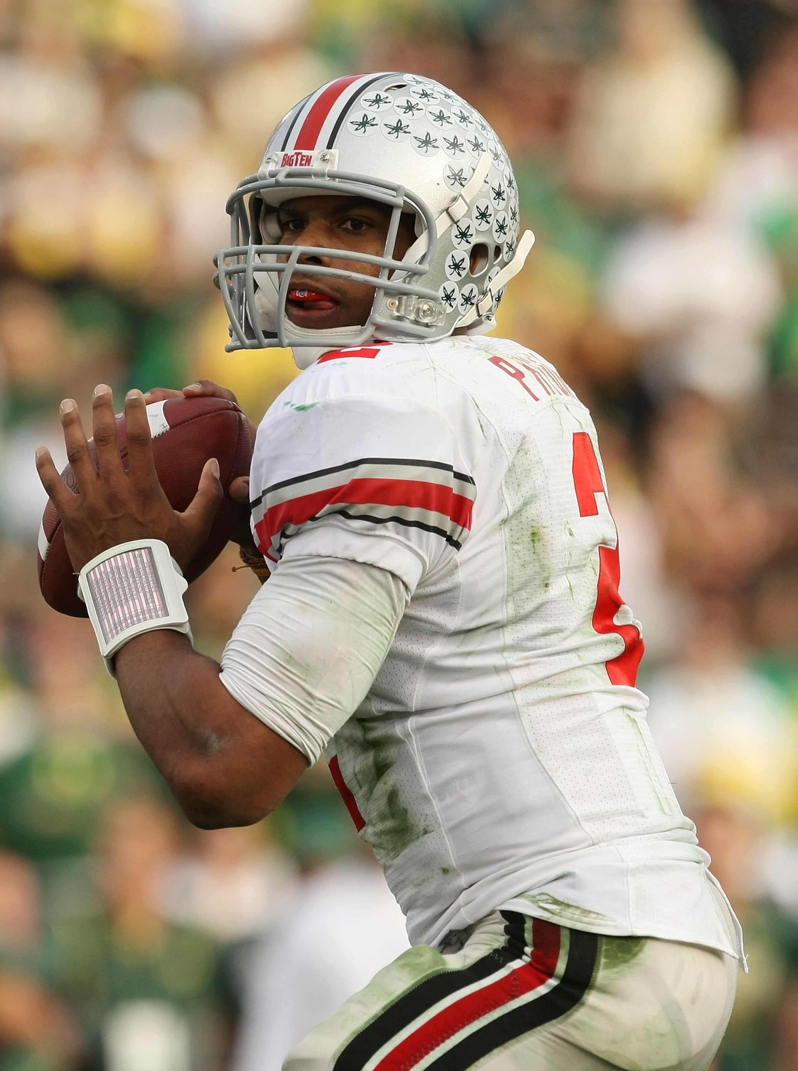 PASADENA, CA - JANUARY 01: Quarterback Terrelle Pryor #2 of the Ohio State Buckeyes drops back to pass against the Oregon Ducks during the 96th Rose Bowl game on January 1, 2010 in Pasadena, California. (Photo by Stephen Dunn/Getty Images) PASADENA, CA - JANUARY 01: Quarterback Terrelle Pryor #2 of the Ohio State Buckeyes drops back to pass against the Oregon Ducks during the 96th Rose Bowl game on January 1, 2010 in Pasadena, California. (Photo by Stephen Dunn/Getty Images)