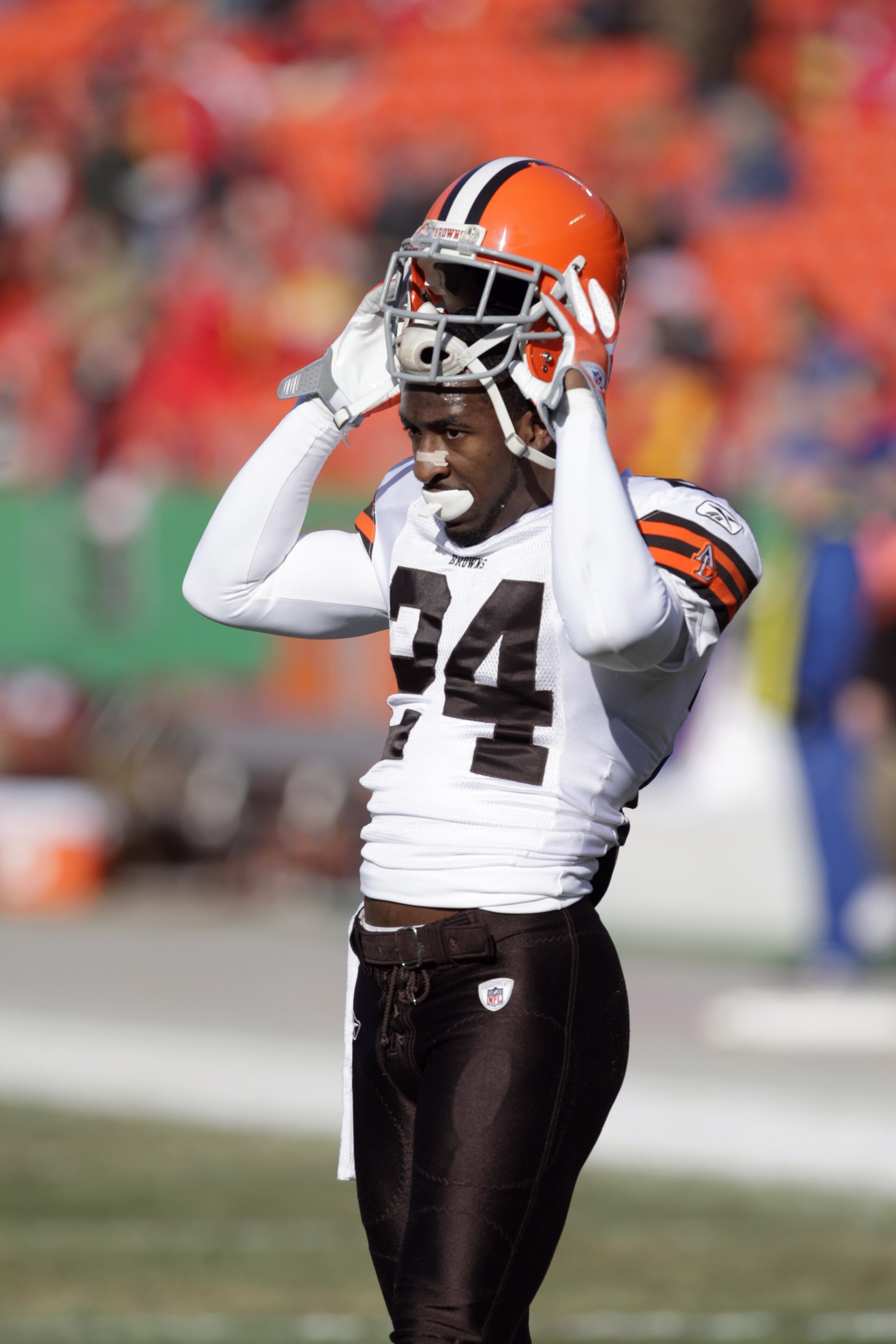 KANSAS CITY, MO - DECEMBER 20:  Eric Wright #24 of the Cleveland Browns puts on his helmet during their NFL game against the Kansas City Chiefs on December 20, 2009 at Arrowhead Stadium in Kansas City, Missouri. The Browns defeated the Chiefs 41-34. (Phot