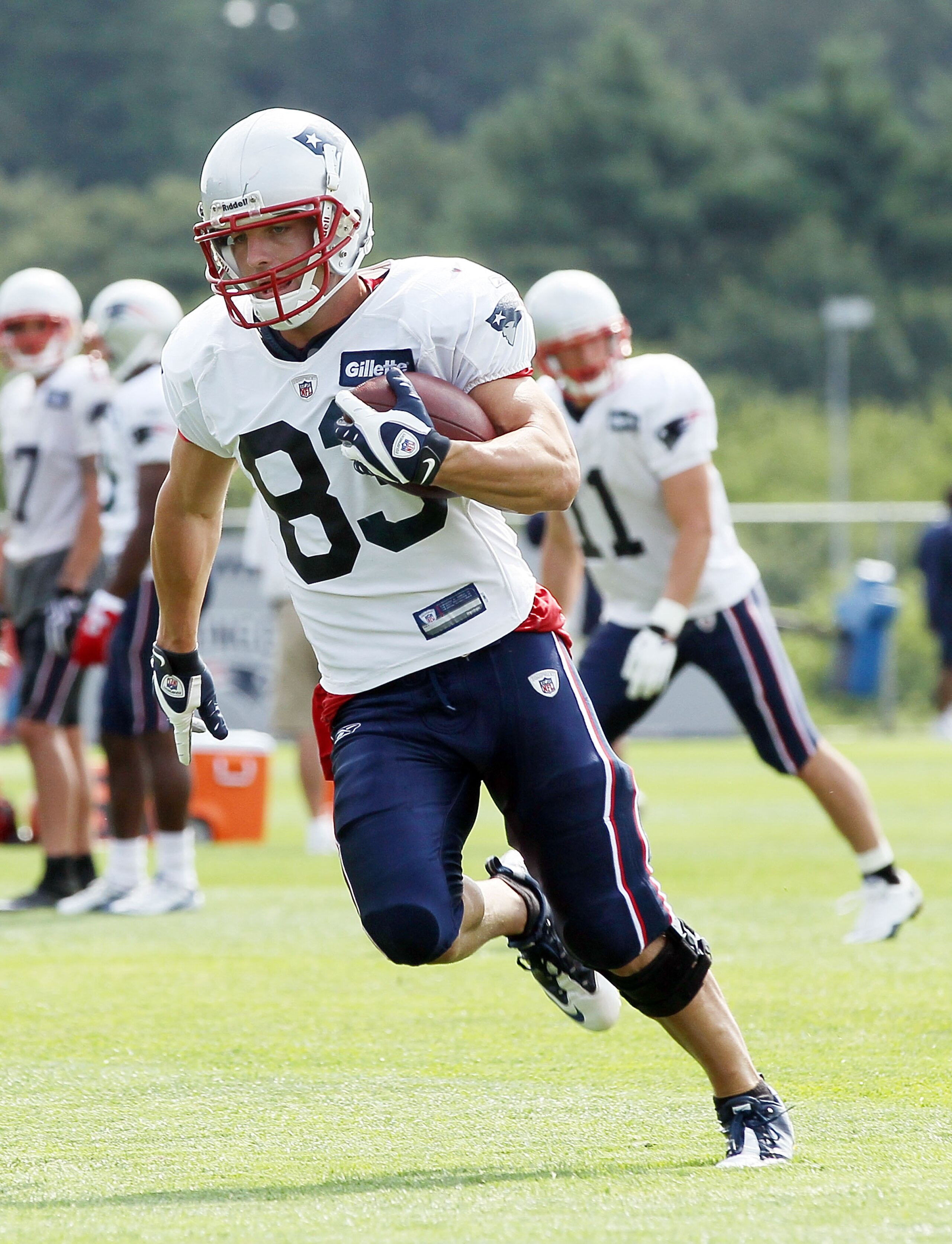 FOXBORO, MA - AUGUST 02:  Wes Welker #83 of the New England Patriots carries the ball during training camp on August 2, 2010 at Gillette Stadium in Foxboro, Massachusetts.  (Photo by Elsa/Getty Images)