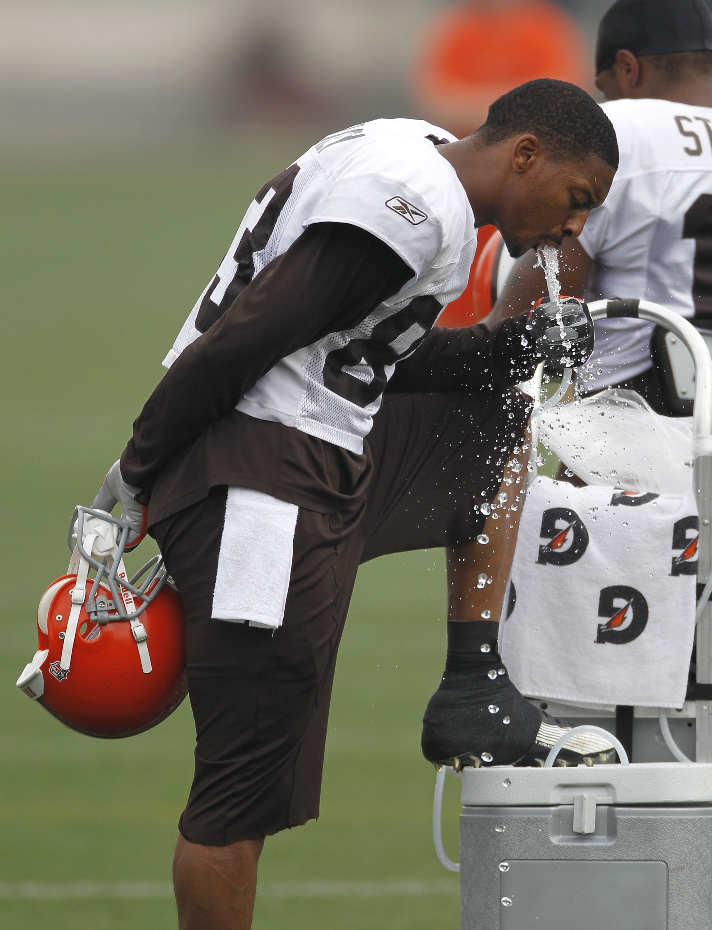 BEREA, OH - AUGUST 04:  Chansi Stuckey #83 of the Cleveland Browns gets a drink of water during training camp at the Cleveland Browns Training and Administrative Complex on August 4, 2010 in Berea, Ohio.  (Photo by Gregory Shamus/Getty Images)