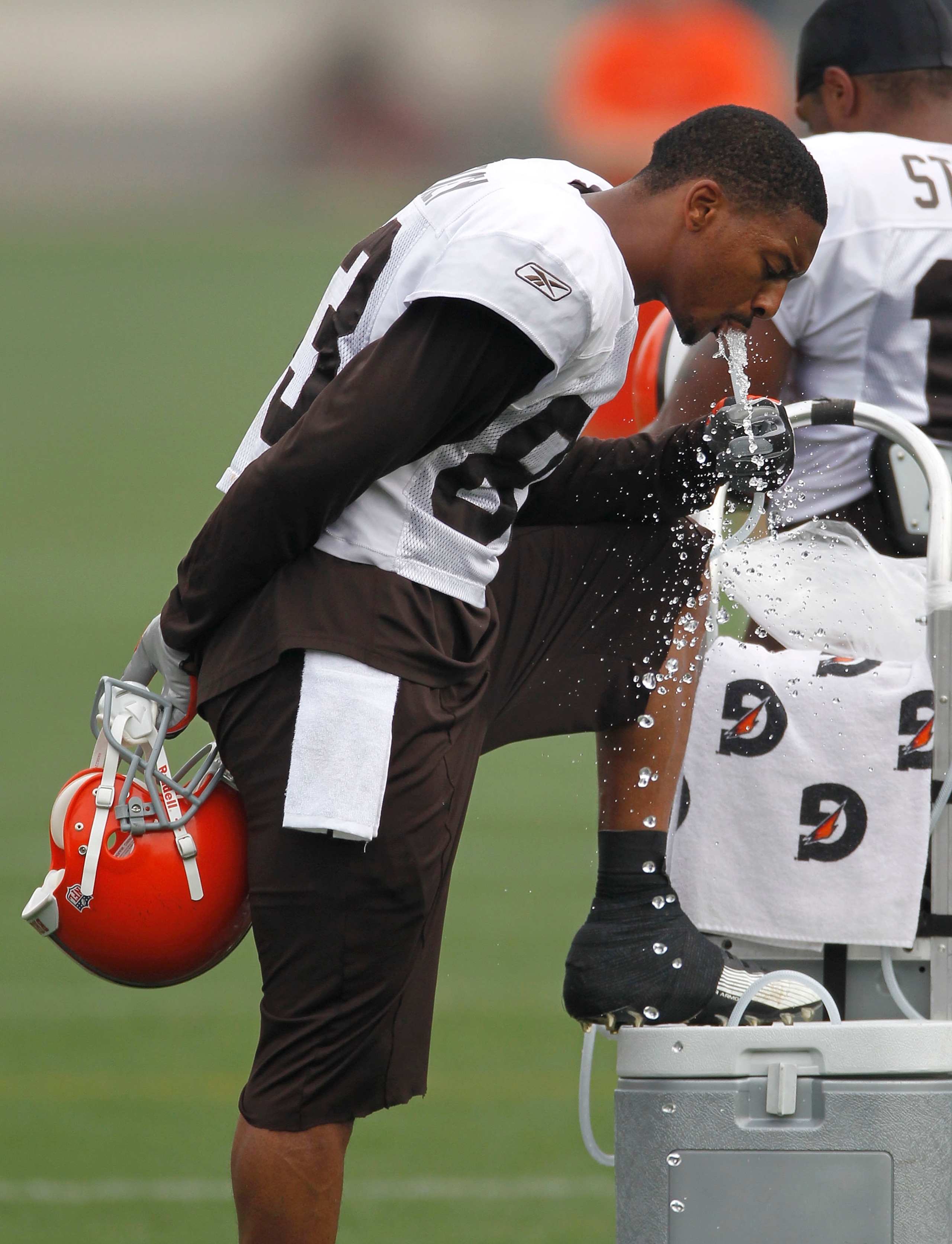 BEREA, OH - AUGUST 04:  Chansi Stuckey #83 of the Cleveland Browns gets a drink of water during training camp at the Cleveland Browns Training and Administrative Complex on August 4, 2010 in Berea, Ohio.  (Photo by Gregory Shamus/Getty Images)