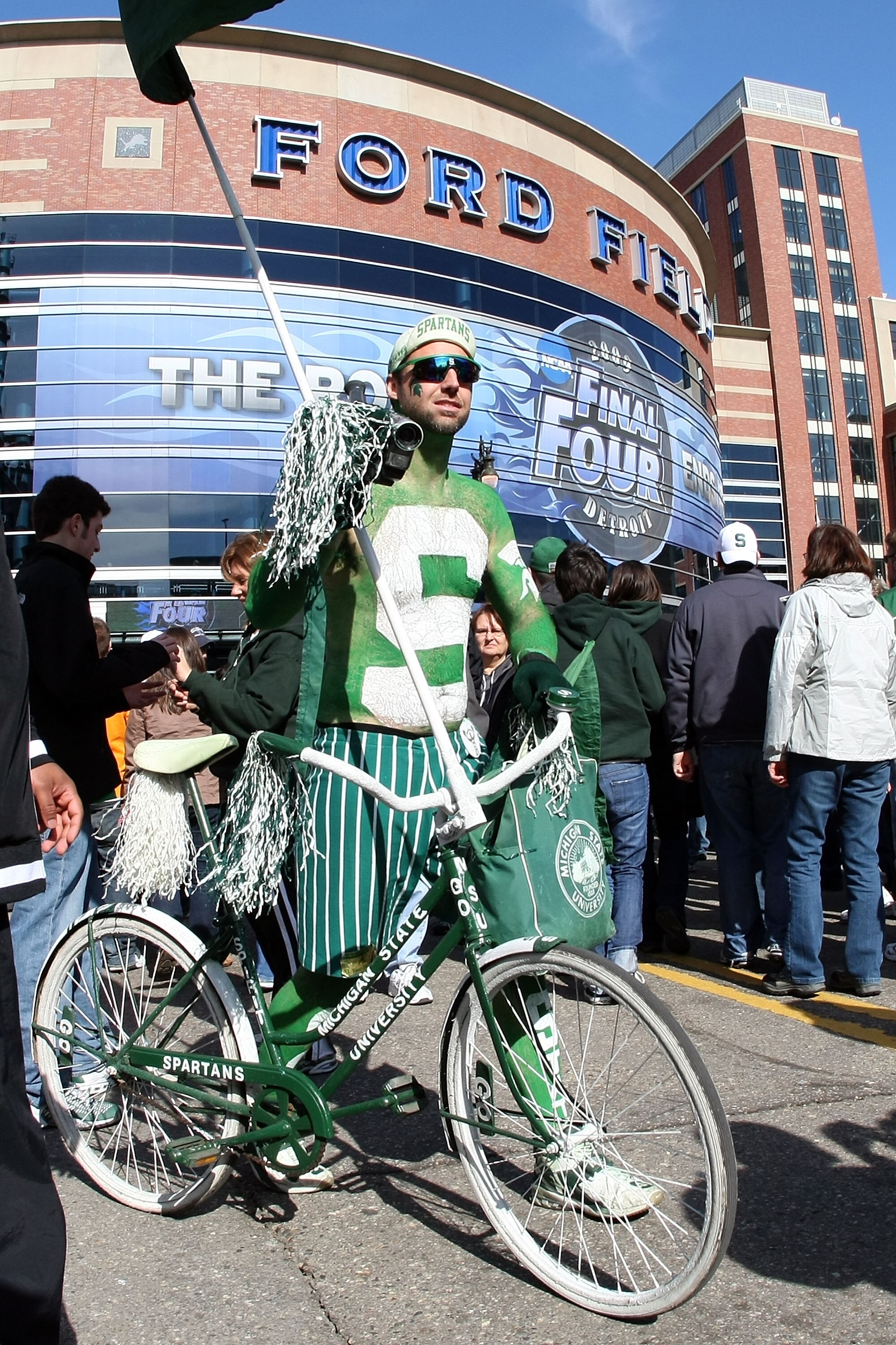 DETROIT - APRIL 04:  A Michigan State Spartans fan poses outside Ford Field before the Spartans take on the Connecticut Huskies during the National Semifinal game of the NCAA Division I Men's Basketball Championship at Ford Field on April 4, 2009 in Detro