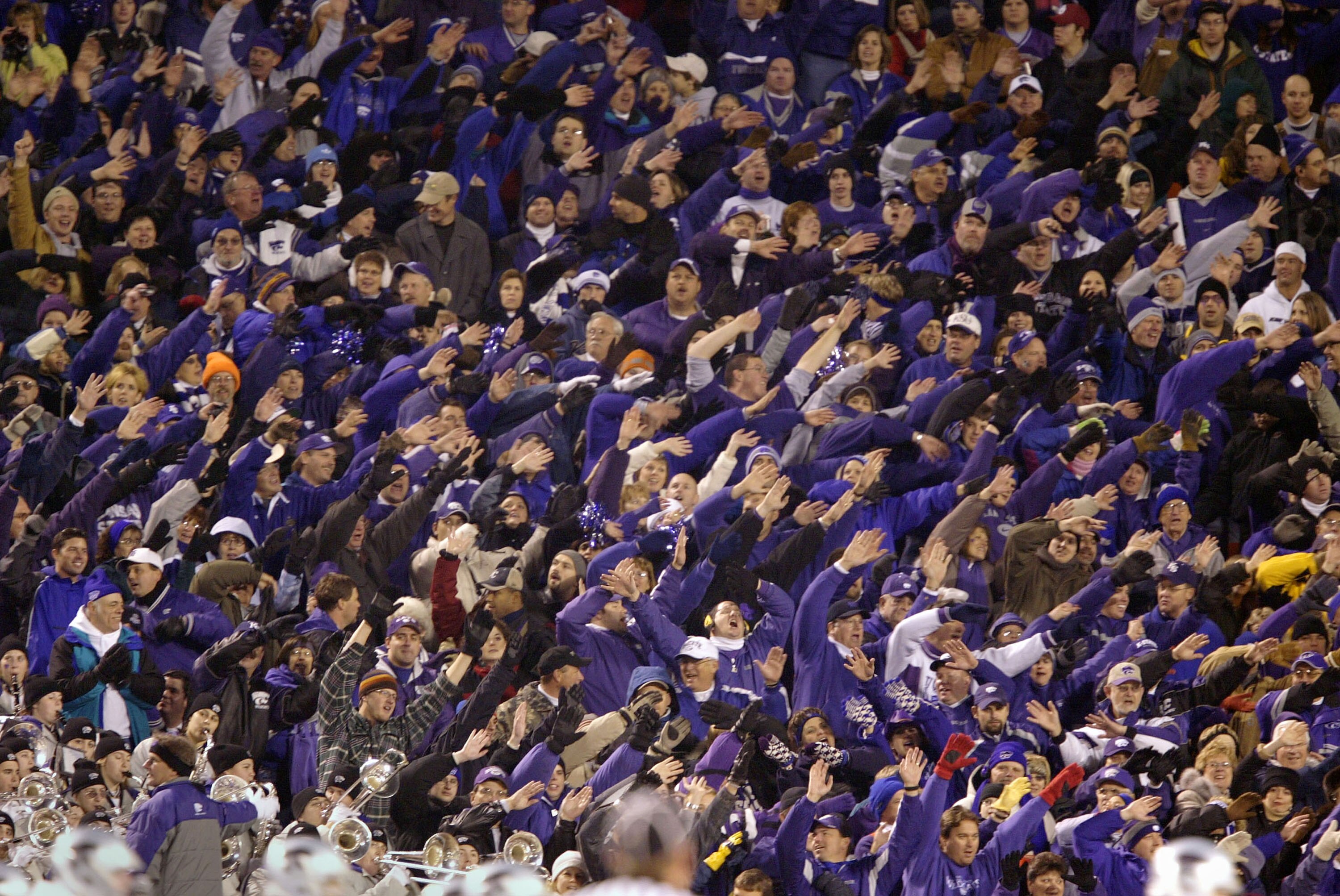 KANSAS CITY, MO - DECEMBER 6:  Kansas State Wildcats fans wave goodbye to the Oklahoma Sooners late in the fourth quarter of the Dr. Pepper Big 12 Championship December 6, 2003 at Arrowhead Stadium in Kansas City, Missouri.  Kansas State upset Oklahoma 35