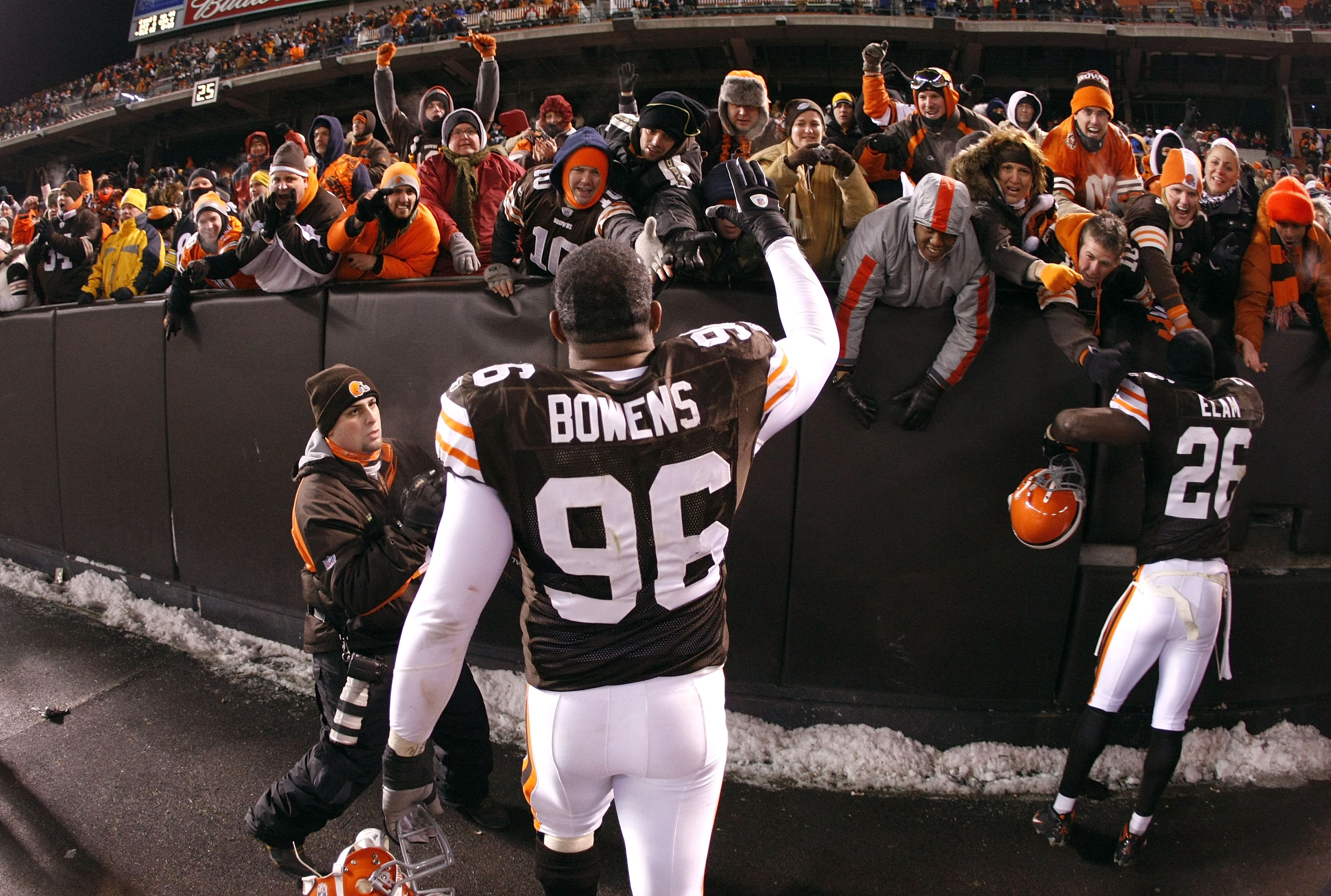 CLEVELAND - DECEMBER 10: David Bowens #96 of the Cleveland Browns celebrates with fans after beating the Pittsburgh Steelers 13-6 on December 10, 2009 at Cleveland Browns Stadium in Cleveland, Ohio.  (Photo by Gregory Shamus/Getty Images)