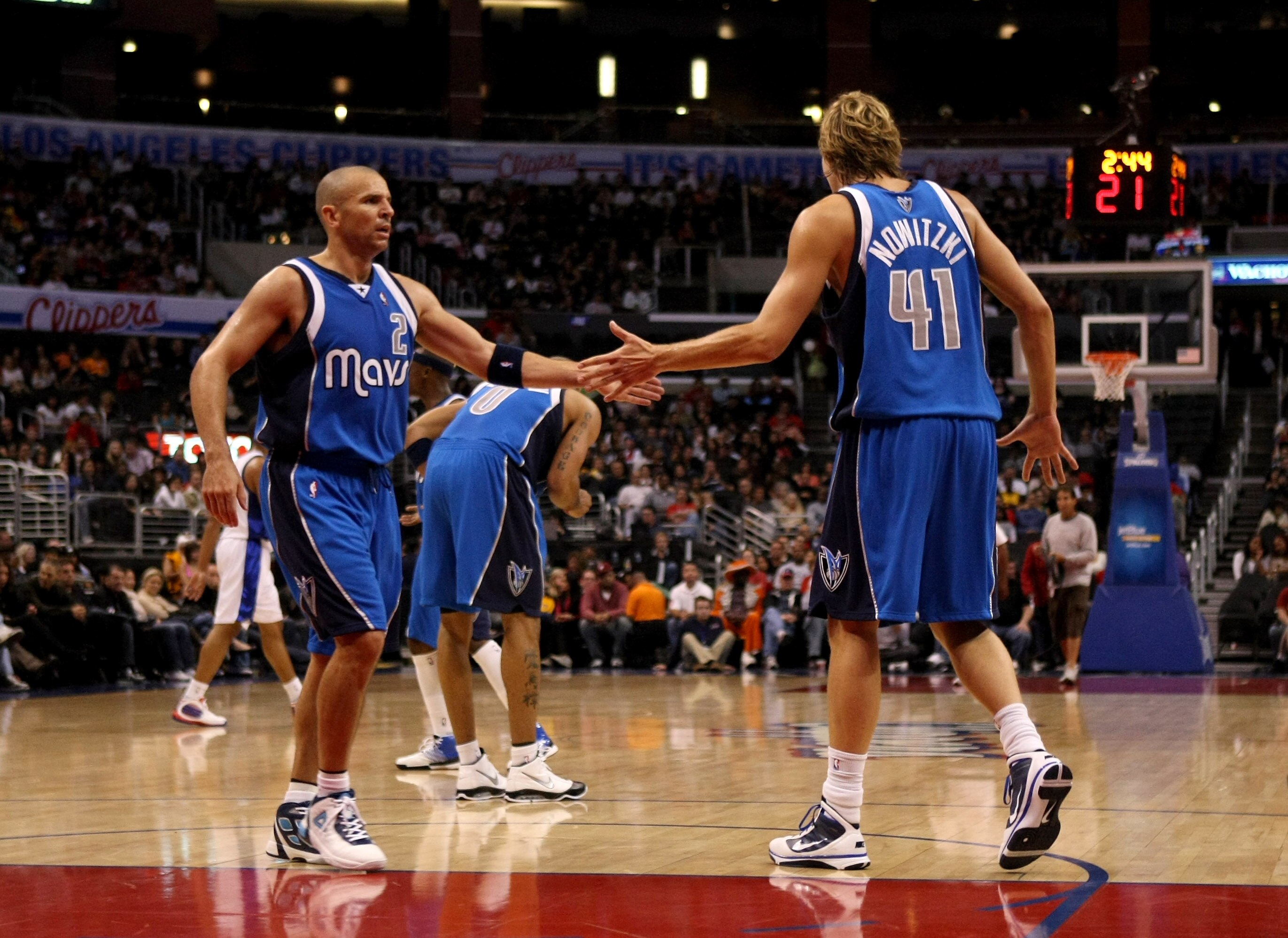 LOS ANGELES, CA - OCTOBER 31:  Jason Kidd #2 and Dirk Nowitzki #41 of the Dallas Mavericks celebrate during the game against the Los Angeles Clippers on October 31, 2009 at Staples Center in Los Angeles, California.  Dallas won 93-84.   NOTE TO USER: User