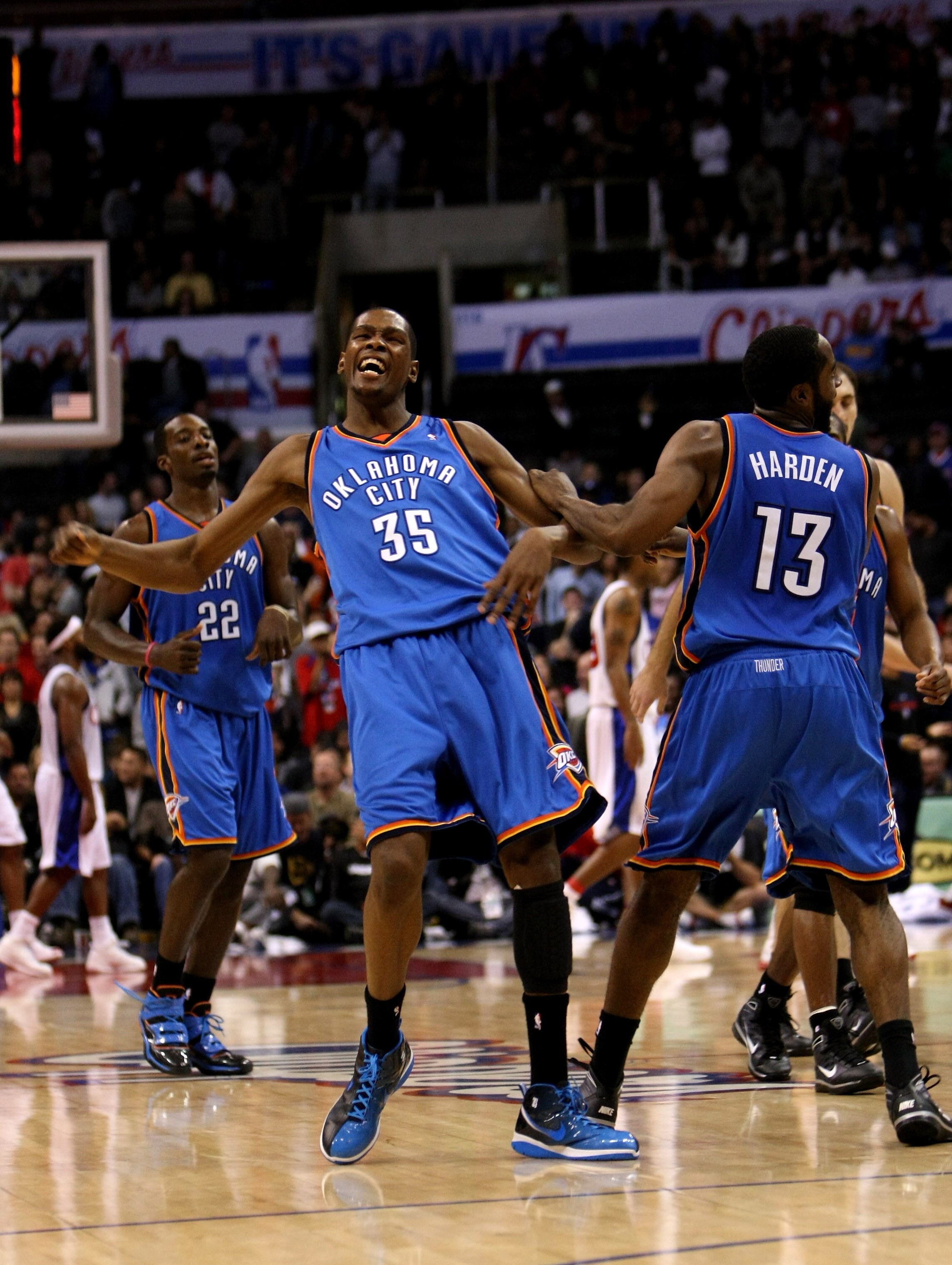 LOS ANGELES - NOVEMBER 11: Kevin Durant #35 of  the Oklahoma City Thunder celebrates with James Harden #13 after his basket gave the Thunder the lead for good with 38 seconds remaining in the game against the Los Angeles Clippers on November 11, 2009 at S