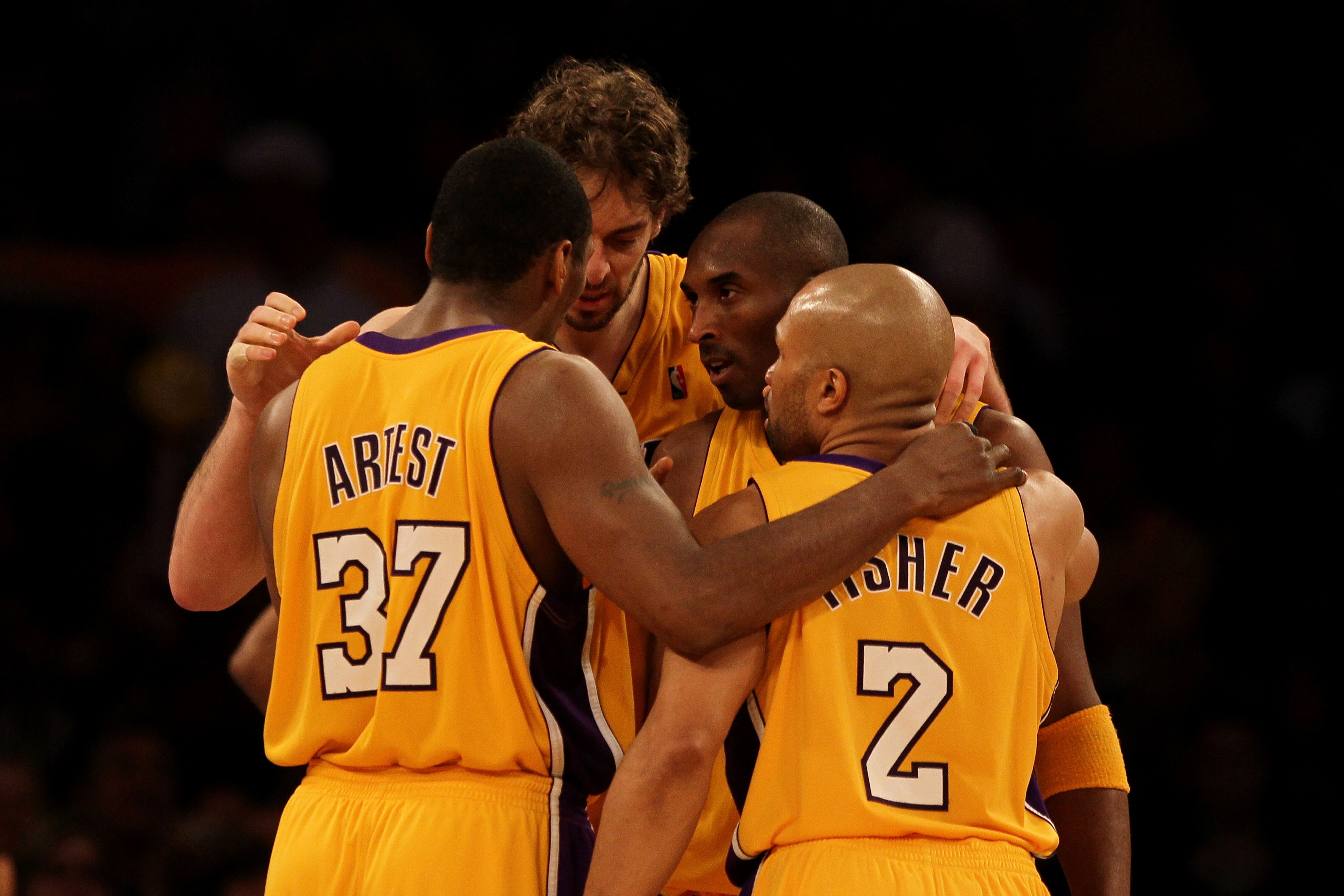 LOS ANGELES, CA - MAY 19:  (L-R) Ron Artest #37, Pau Gasol #16, Kobe Bryant #24 and Derek Fisher #2 of the Los Angeles Lakers huddle together in Game Two of the Western Conference Finals against the Phoenix Suns during the 2010 NBA Playoffs at Staples Cen