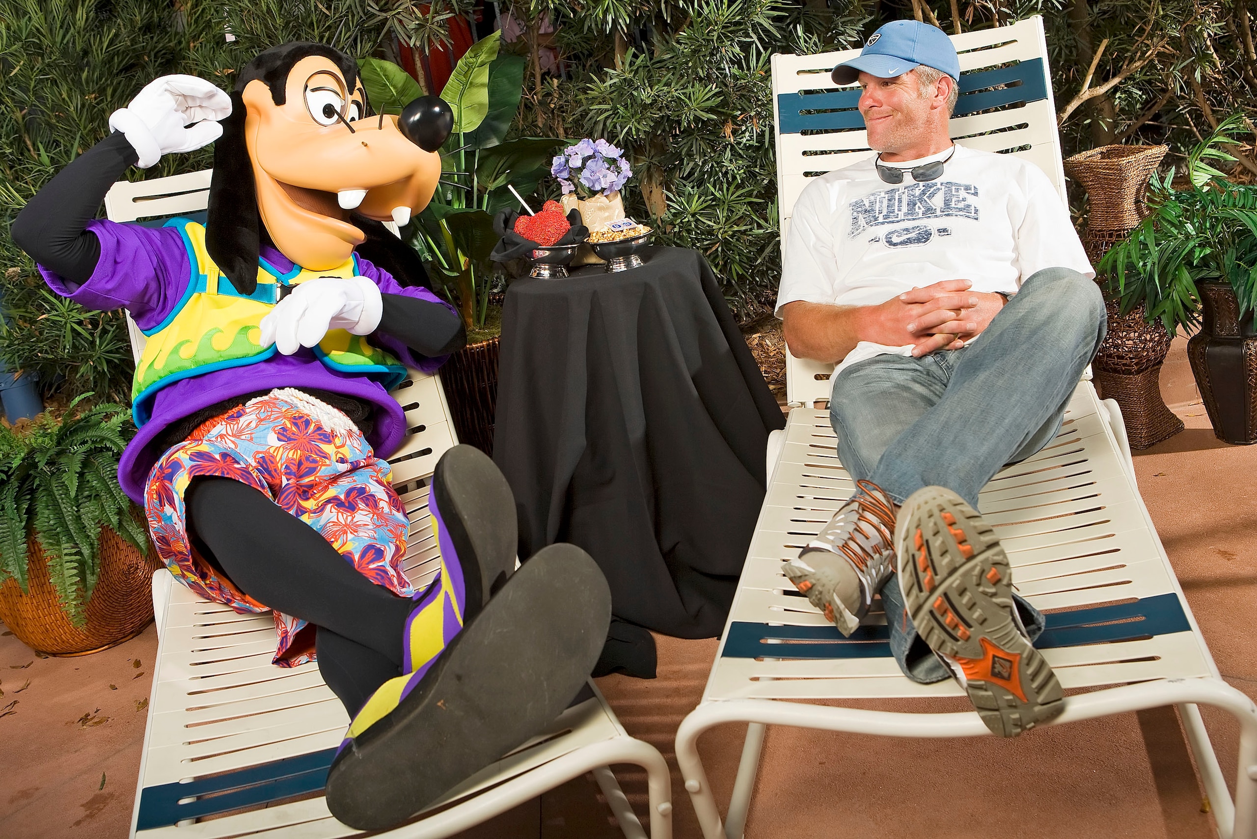 LAKE BUENA VISTA, FL - FEBRUARY 28: In this handout photo provided by Walt Disney World, in a photo taken February 28, 2009 NFL quarterback Brett Favre lounges with Goofy at Walt Disney World Resort in Lake Buena Vista, Florida. Favre was appearing at ' LAKE BUENA VISTA, FL - FEBRUARY 28: In this handout photo provided by Walt Disney World, in a photo taken February 28, 2009 NFL quarterback Brett Favre lounges with Goofy at Walt Disney World Resort in Lake Buena Vista, Florida. Favre was appearing at '