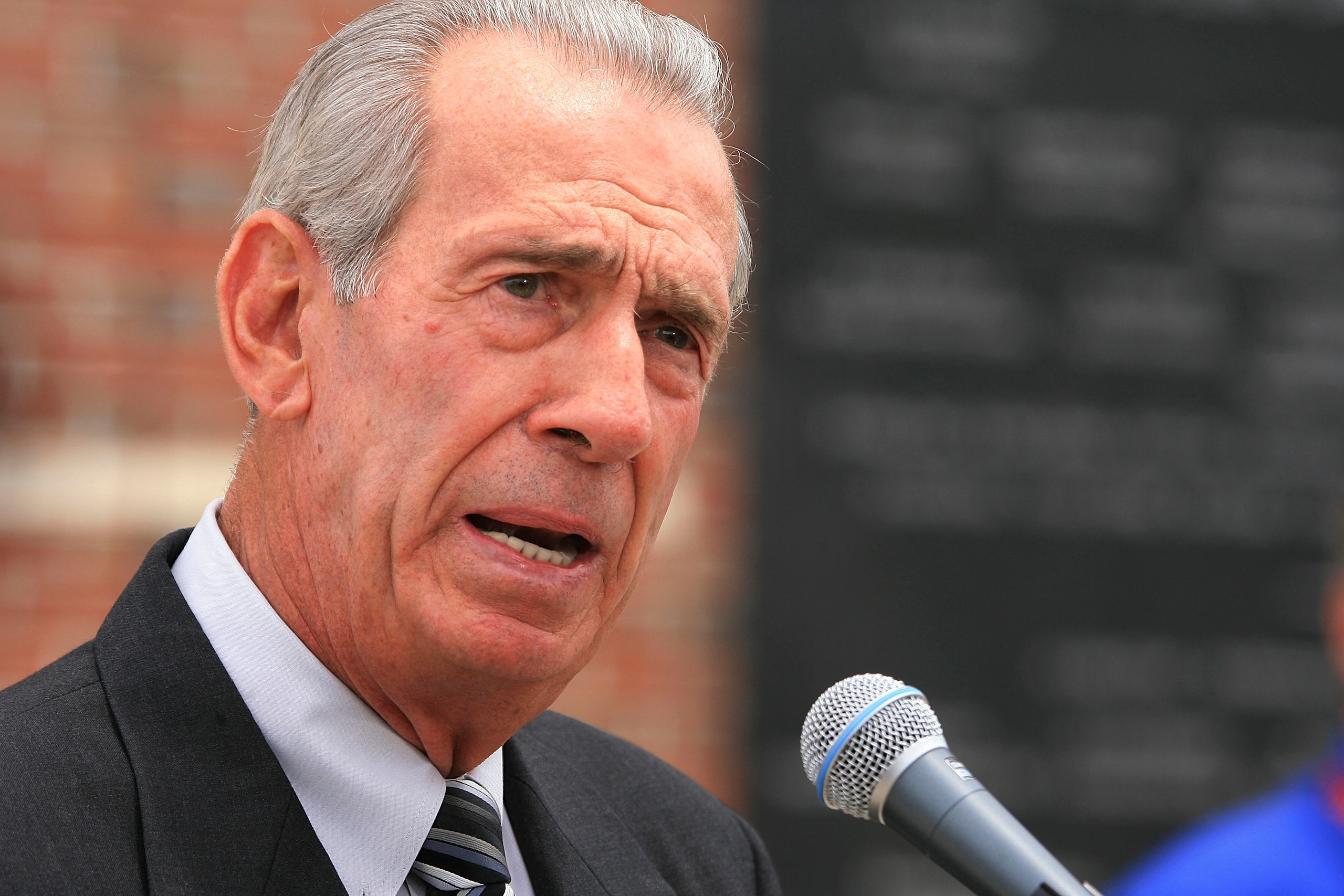DAYTONA BEACH, FL - JUNE 07:  Ned Jarrett speaks at the funeral service for Bill France Jr. at Mary McLeod Bethune Performing Arts Center June 7, 2007 in Daytona Beach, Florida. France died June 4 at the age of 74.  (Photo by Jerry Markland/Getty Images f