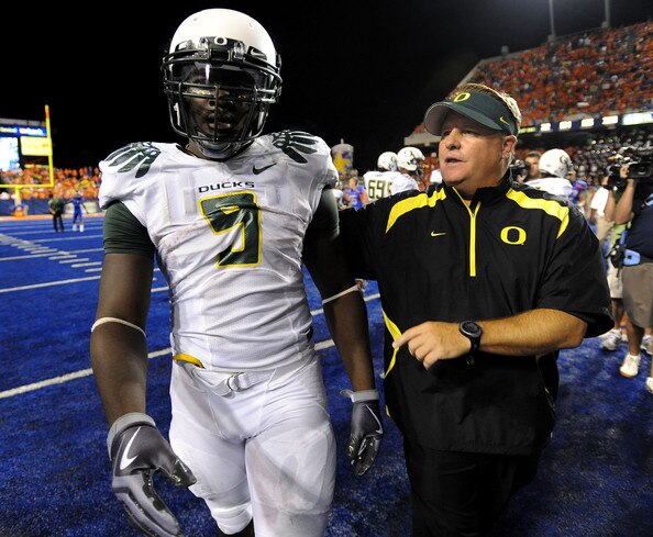LeGarrette Blount walks off the field after a loss and a right hook.