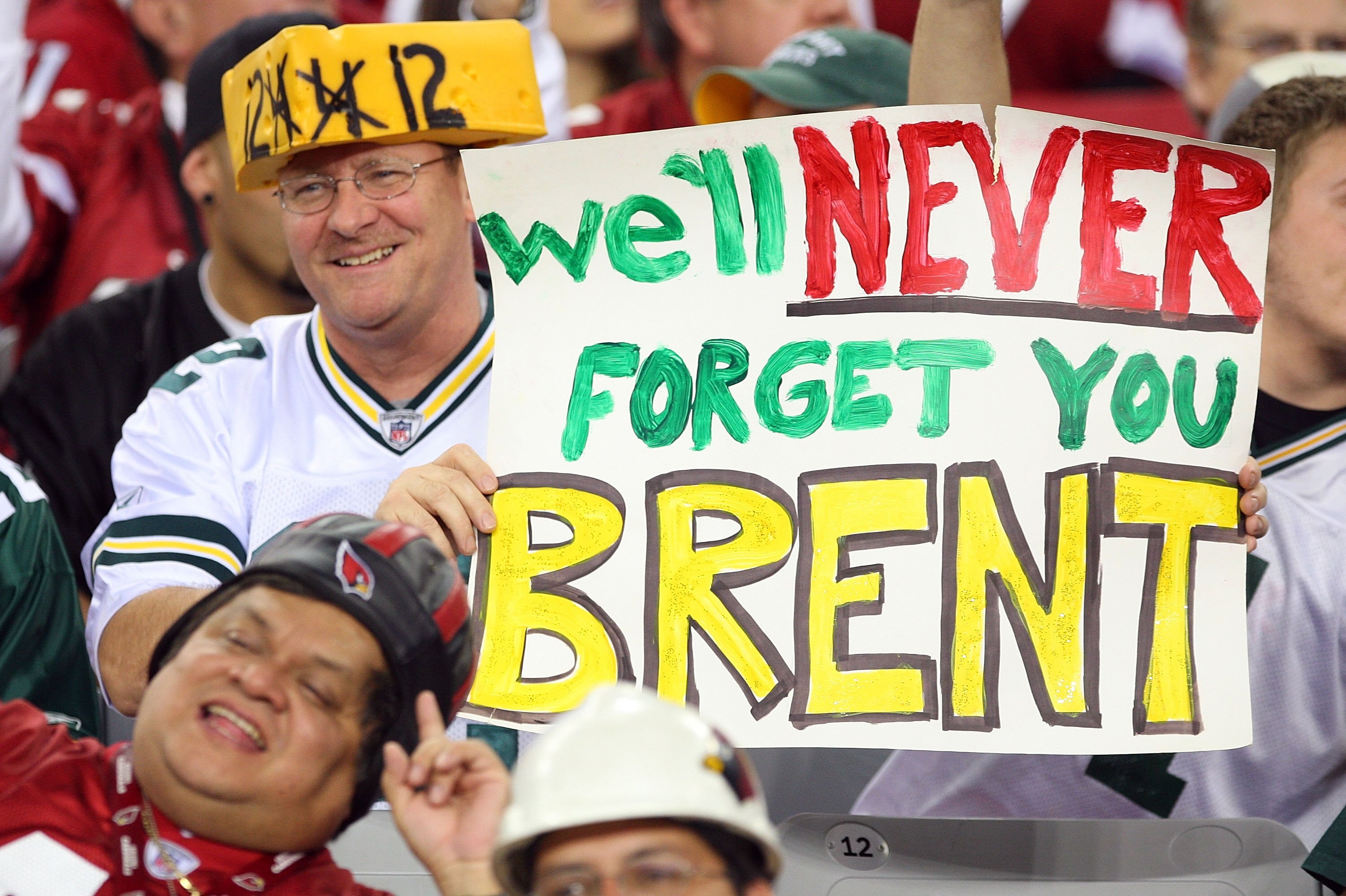 GLENDALE, AZ - JANUARY 03:  A Green Bay Packers fan cheers on the team against the Arizona Cardinals at University of Phoenix Stadium on January 3, 2010 in Glendale, Arizona.  (Photo by Maxx Wolfson/Getty Images)