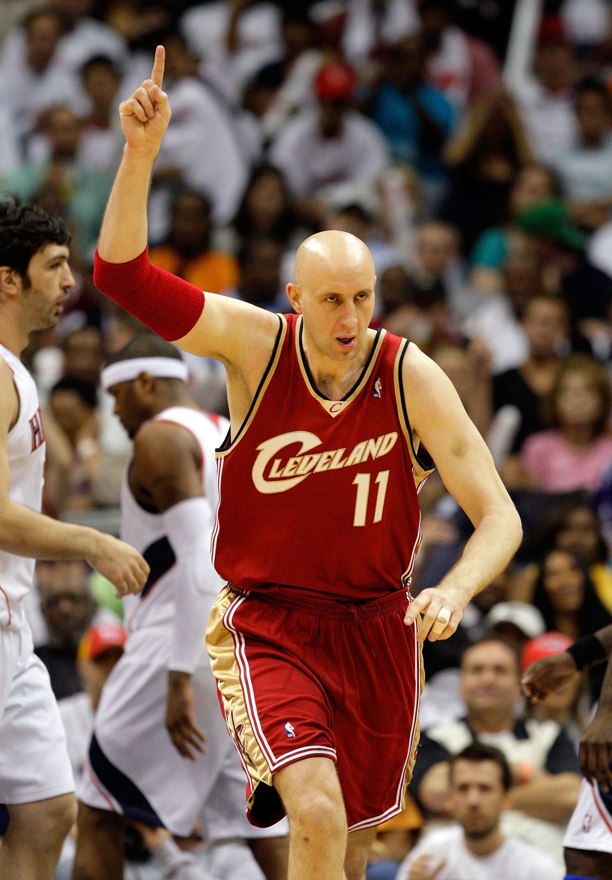 ATLANTA - MAY 11:  Zydrunas Ilgauskas #11 of the Cleveland Cavaliers reacts after scoring a basket against the Atlanta Hawks during Game Four of the Eastern Conference Semifinals during the 2009 NBA Playoffs at Philips Arena on May 11, 2009 in Atlanta, Ge
