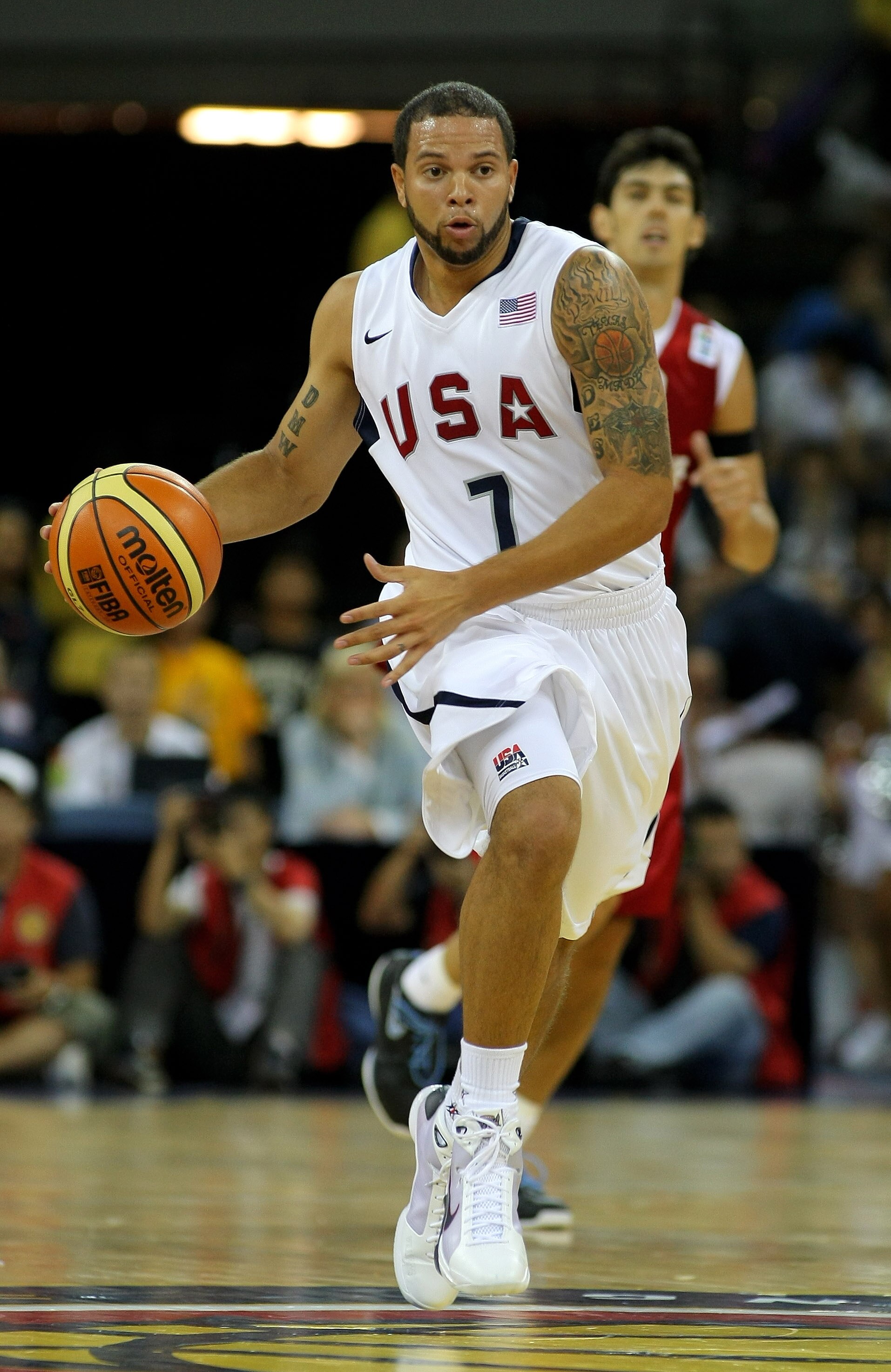 MACAU, CHINA - JULY 31:  Deron Williams # 7of the USA Basketball Men's Senior National Team runs with the ball during the USA Basketball International challenge between USA and Turkey at the Venetian Hotel on July 31, 2008 in Macau, China.  (Photo by Stu