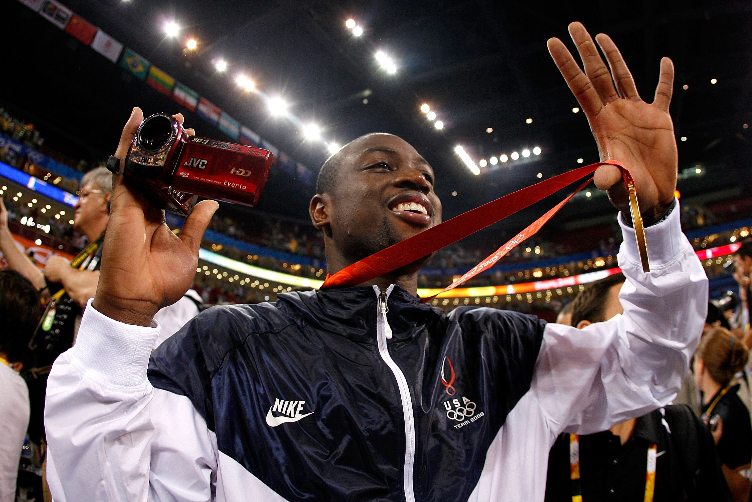 BEIJING - AUGUST 24:  Dwyane Wade #9 of the United States holds his gold medal after defeating Spain 118-107 in the gold medal game during Day 16 of the Beijing 2008 Olympic Games at the Beijing Olympic Basketball Gymnasium on August 24, 2008 in Beijing,