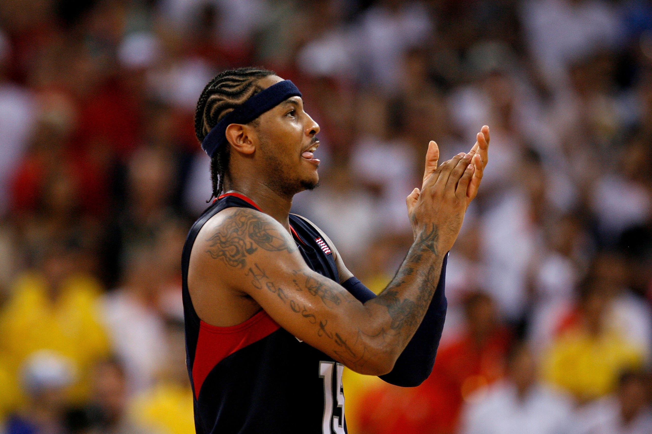 BEIJING - AUGUST 24: Carmelo Anthony #15 of the United States claps after defeating Spain 118-107 in the gold medal game during Day 16 of the Beijing 2008 Olympic Games at the Beijing Olympic Basketball Gymnasium on August 24, 2008 in Beijing, China. (P BEIJING - AUGUST 24: Carmelo Anthony #15 of the United States claps after defeating Spain 118-107 in the gold medal game during Day 16 of the Beijing 2008 Olympic Games at the Beijing Olympic Basketball Gymnasium on August 24, 2008 in Beijing, China. (P