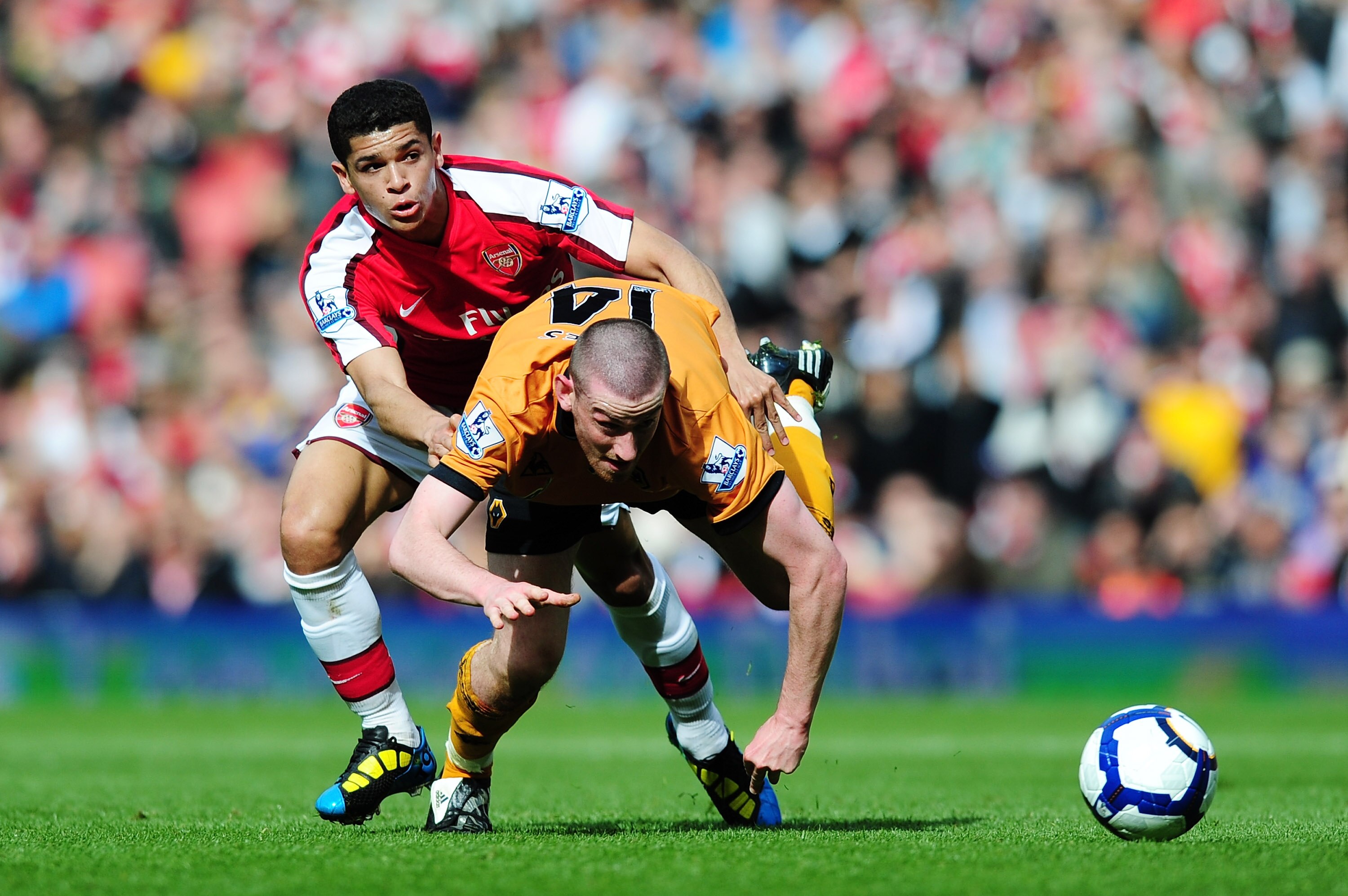 LONDON, ENGLAND - APRIL 03:  Denilson of Arsenal is challenged by David Jones of Wolverhampton Wanderers during the Barclays Premier League match between Arsenal and Wolverhampton Wanderers at the Emirates Stadium on April 3, 2010 in London, England.  (Ph