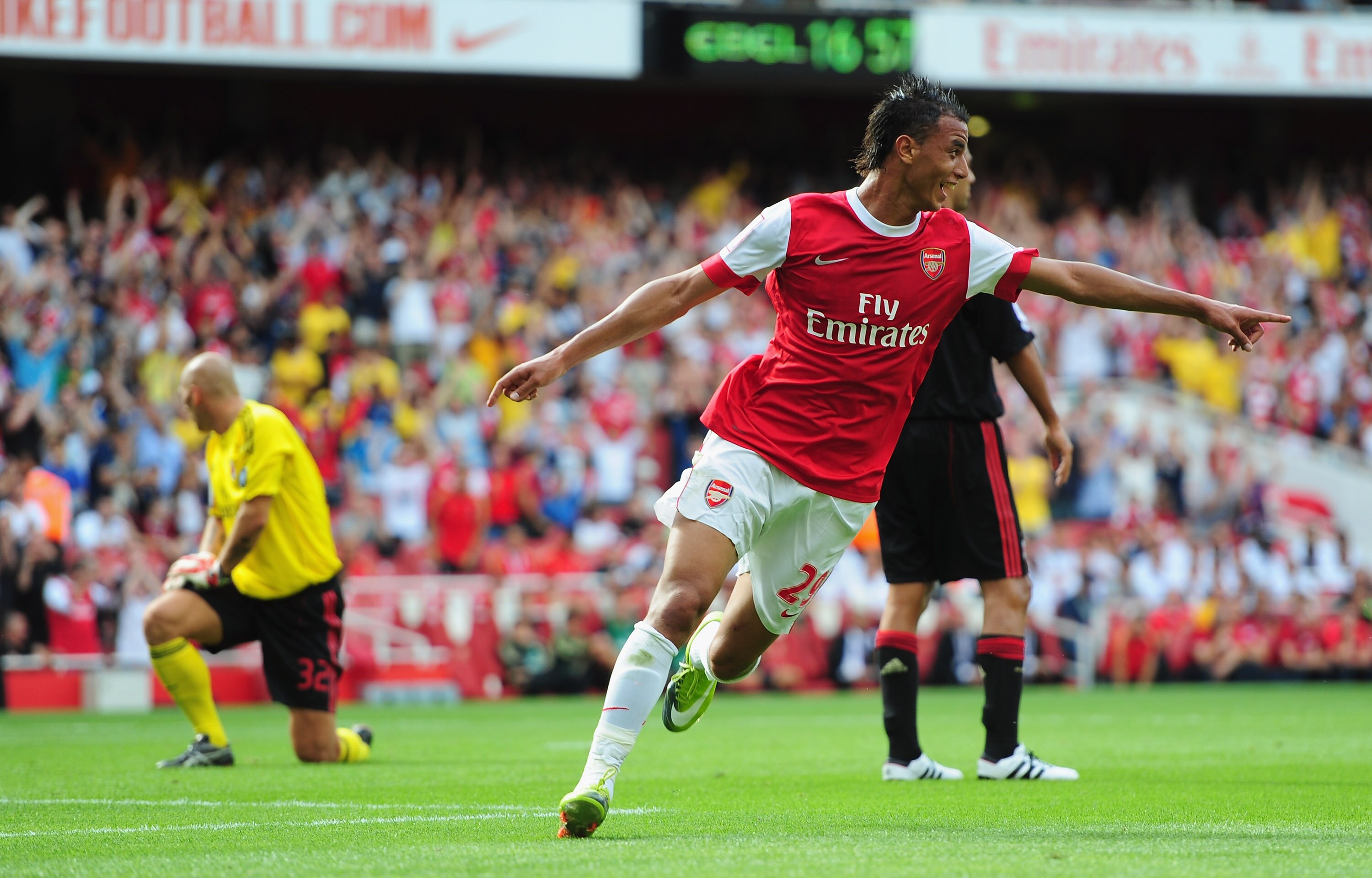 LONDON, ENGLAND - JULY 31:  Marouane Chamakh of Arsenal celebrates after scoring during the Emirates Cup match between Arsenal and AC Milan at Emirates Stadium on July 31, 2010 in London, England.  (Photo by Mike Hewitt/Getty Images)