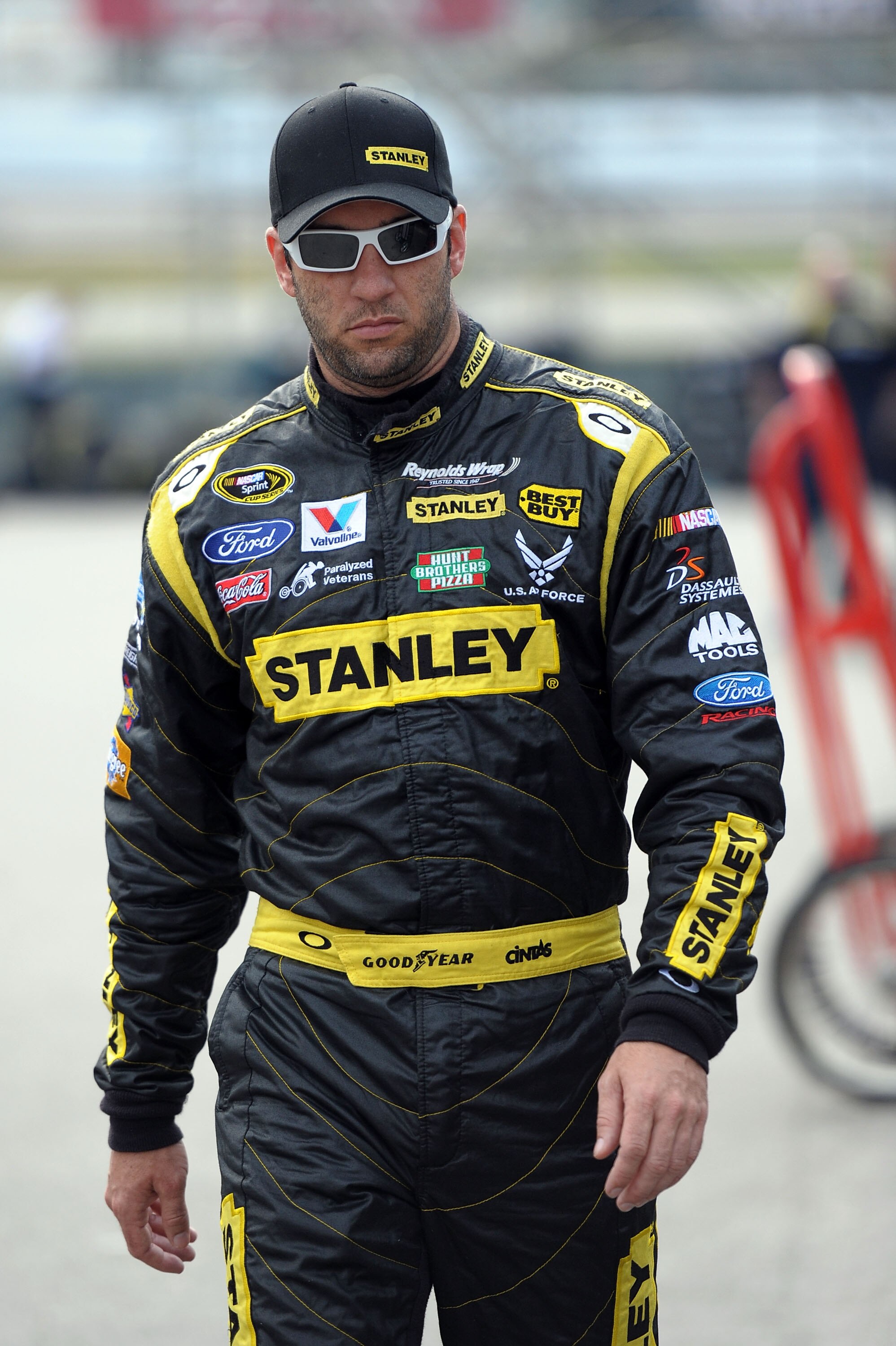 LOUDON, NH - JUNE 26: Elliott Sadler, driver of the #19 Stanley Ford, walks to the garage during practice for the NASCAR Sprint Cup Series LENOX Industrial Tools 301 at New Hampshire Motor Speedway on June 26, 2010 in Loudon, New Hampshire.  (Photo by Dre