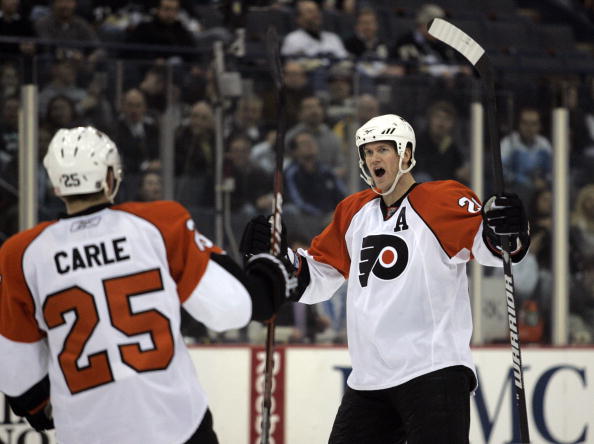 PITTSBURGH, PA - JANUARY 7: Chris Pronger #20 of the Philadelphia Flyers celebrates his goal with Matt Carle #25 against the Pittsburgh Penguins in the second period at Mellon Arena on January 7, 2010 in Pittsburgh, Pennsylvania. (Photo by Justin K. Aller