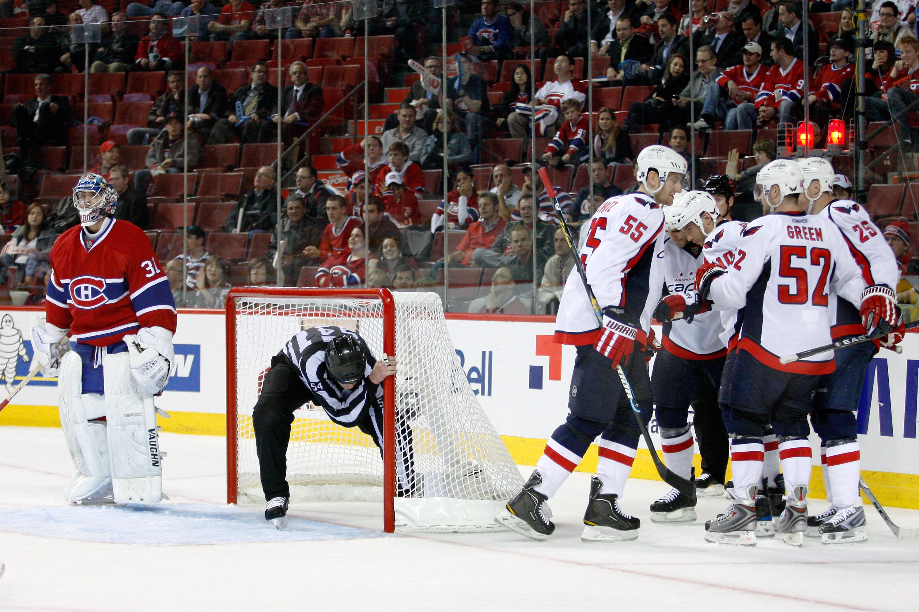 MONTREAL- APRIL 19:  Members of the Washington Capitals celebrate the third period goal from Matt Bradley #10 in Game Three of the Eastern Conference Quarterfinals during the 2010 NHL Stanley Cup Playoffs against the Montreal Canadiens at the Bell Centre