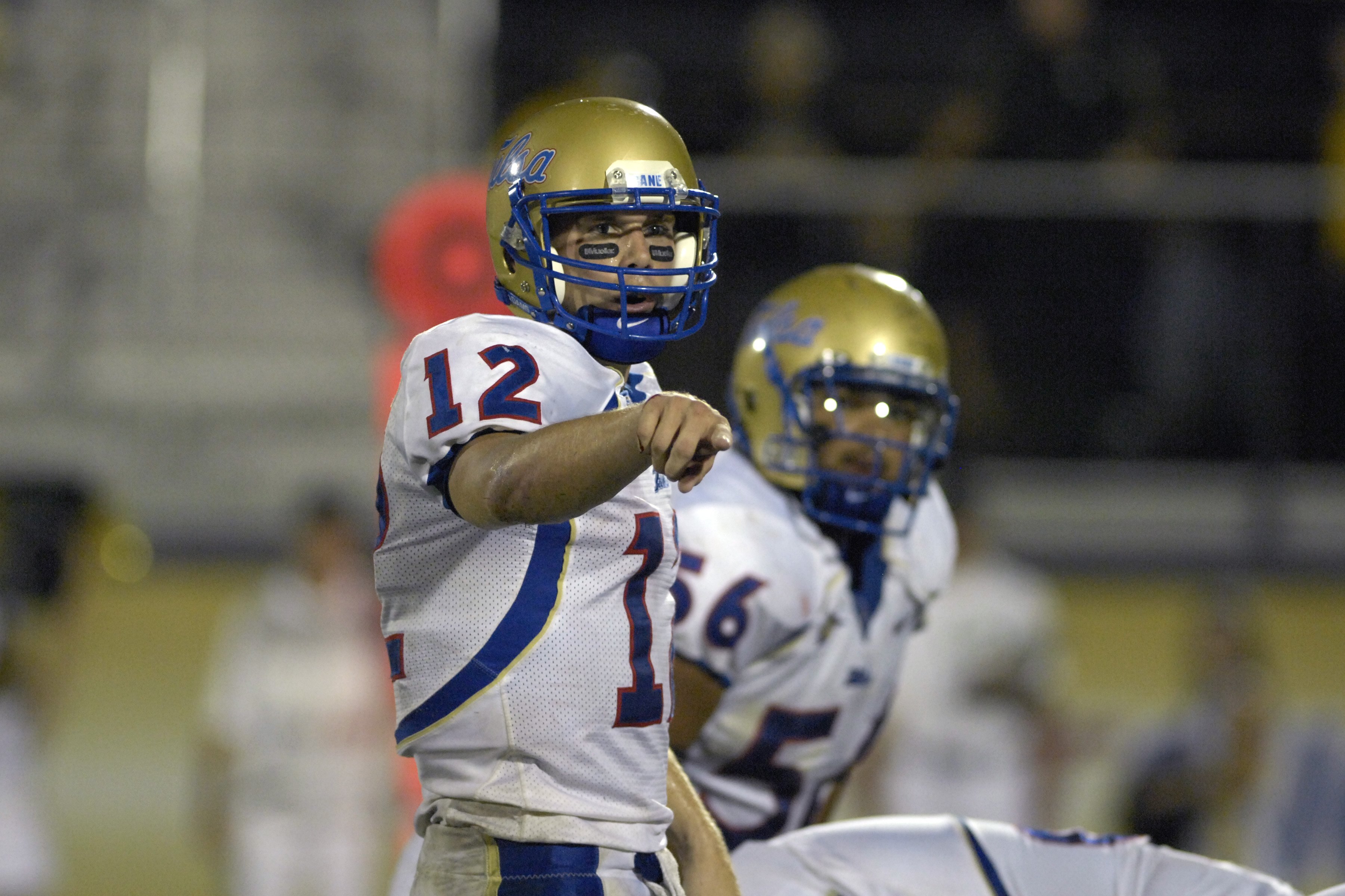 ORLANDO, FL - OCTOBER 20: Quarterback Paul Smith #12 of the  Tulsa Golden Hurricane directs play against the University of Central Florida Knights at Bright House Stadium on October 20, 2007 in Orlando, Florida.  UCF won 44 - 23. (Photo by Al Messerschmid