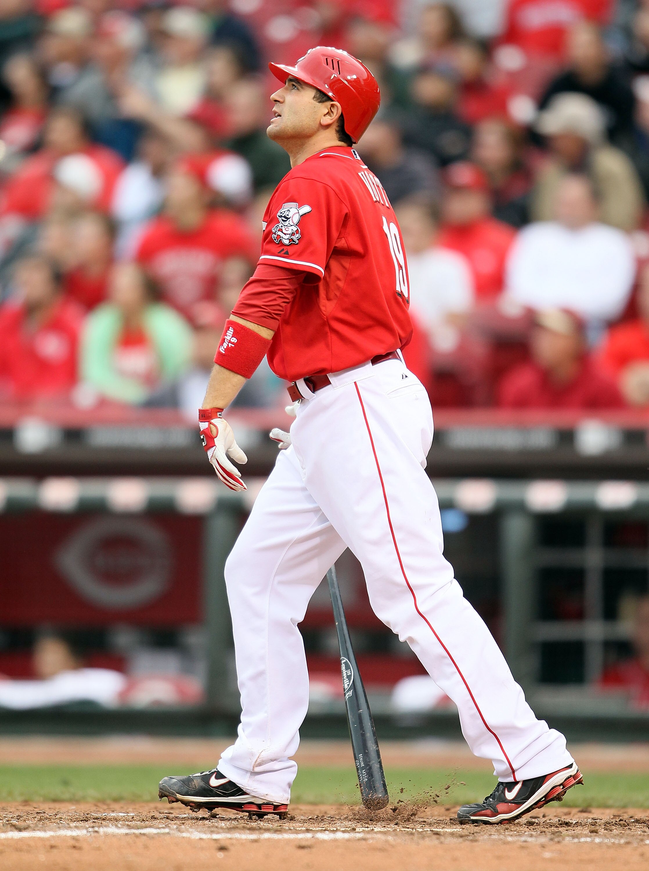 CINCINNATI - MAY 18:  Joey Votto #19 of the Cincinnati Reds watches his home run leave the park in the 8th inning during the game against the Milwaukee Brewers at Great American Ball Park on May 18, 2010 in Cincinnati, Ohio. The Reds won 5-4.  (Photo by A