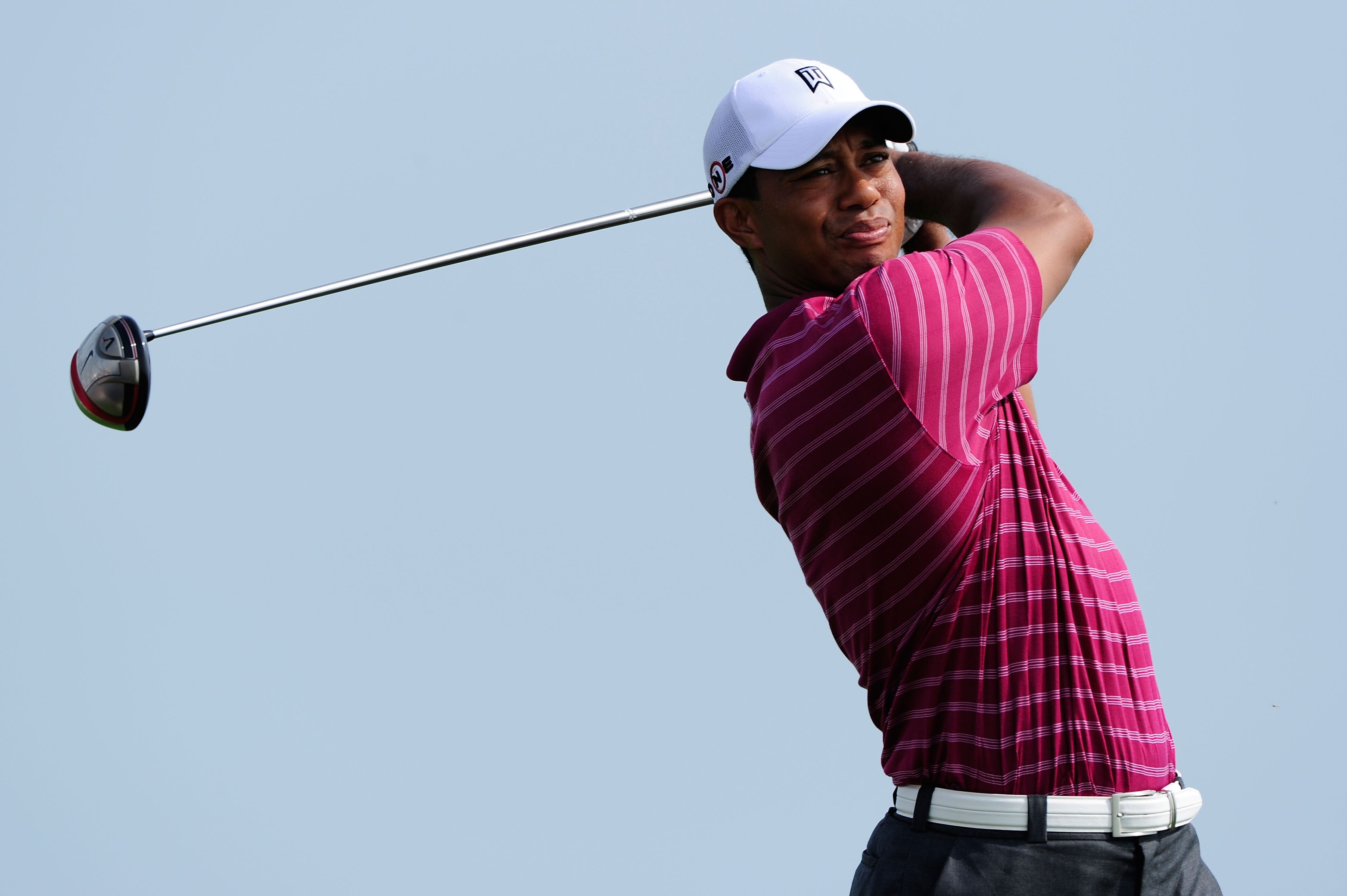 KOHLER, WI - AUGUST 10:  Tiger Woods hits a tee shot during a practice round prior to the start of the 92nd PGA Championship on the Straits Course at Whistling Straits on August 10, 2010 in Kohler, Wisconsin.  (Photo by Stuart Franklin/Getty Images)