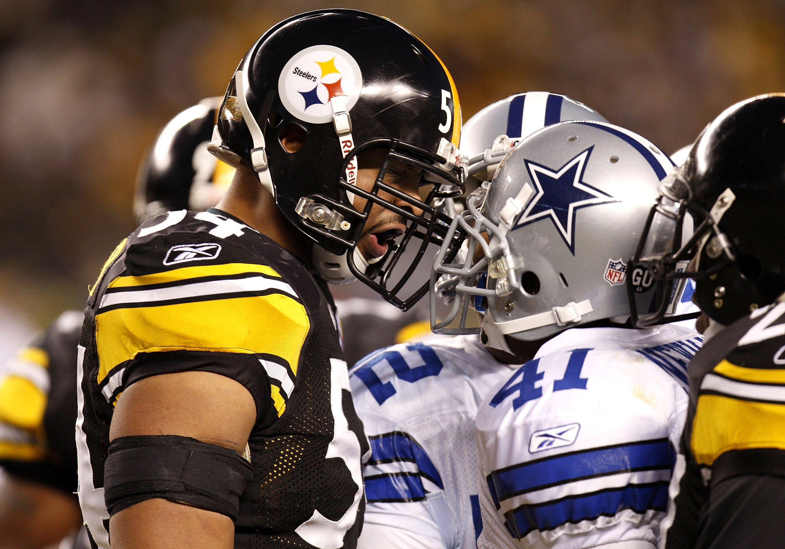 PITTSBURGH - DECEMBER 07:  Andre Frazier #54 of the Pittsburgh Steelers has words with Terence Newman #41 of the Dallas Cowboys during the second quarter on December 7, 2008 at Heinz Field in Pittsburgh, Pennsylvania. Pittsburgh won the game 20-13.  (Phot